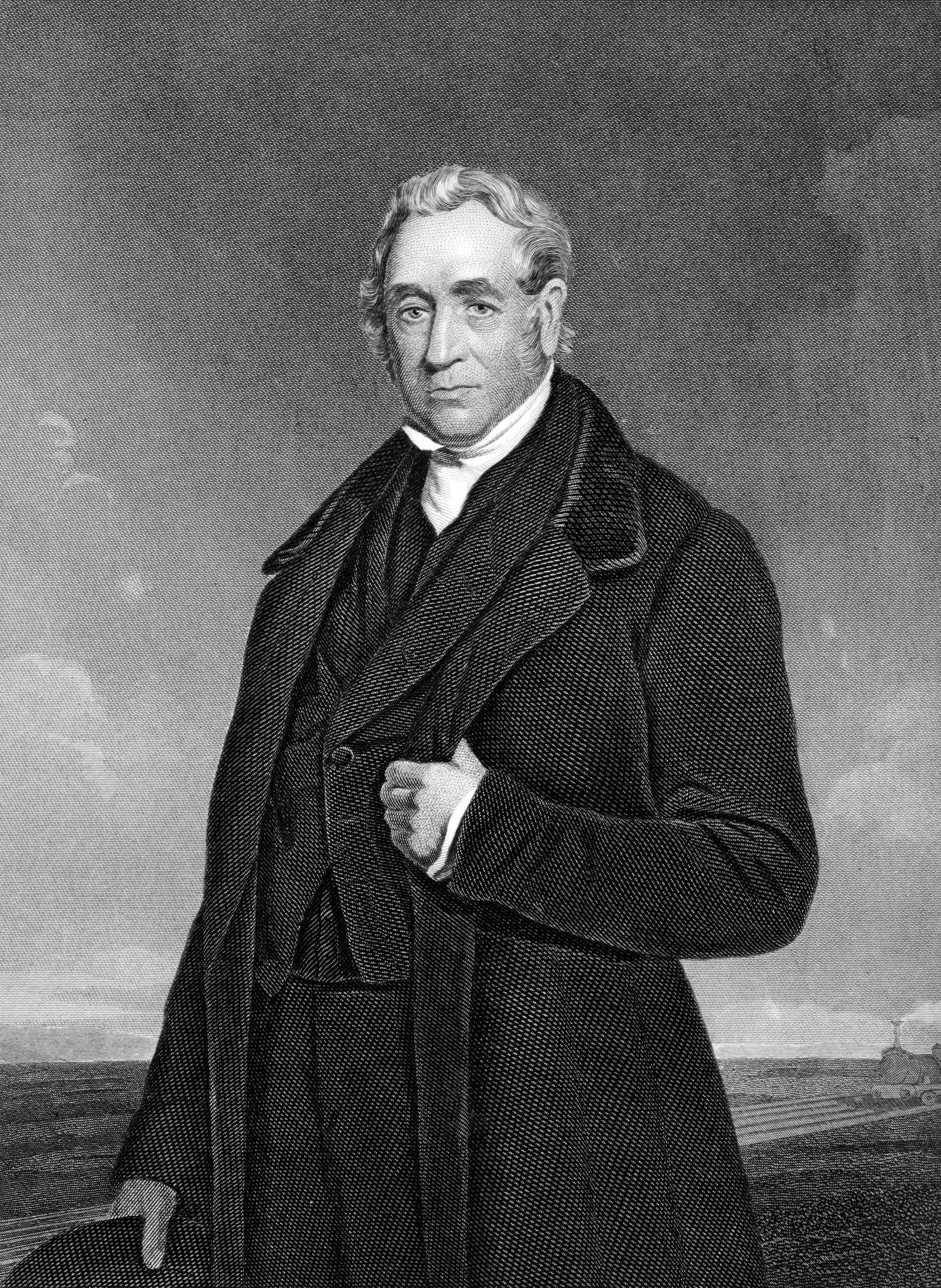 A black and white engraved portrait of The George Stephenson, dressed in 19th-century attire, standing outdoors with a landscape and windmill in the background.