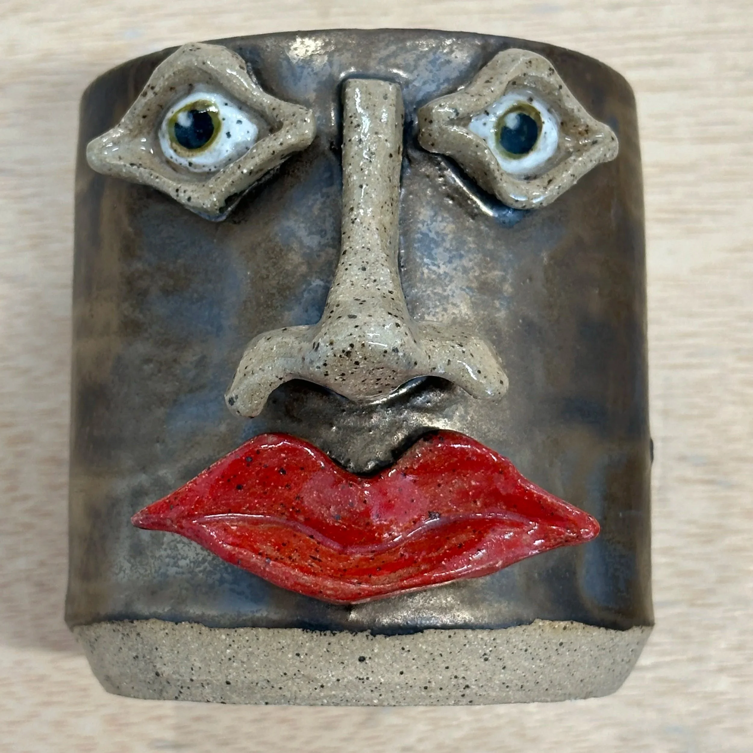 6in tall flowerpot with funny face