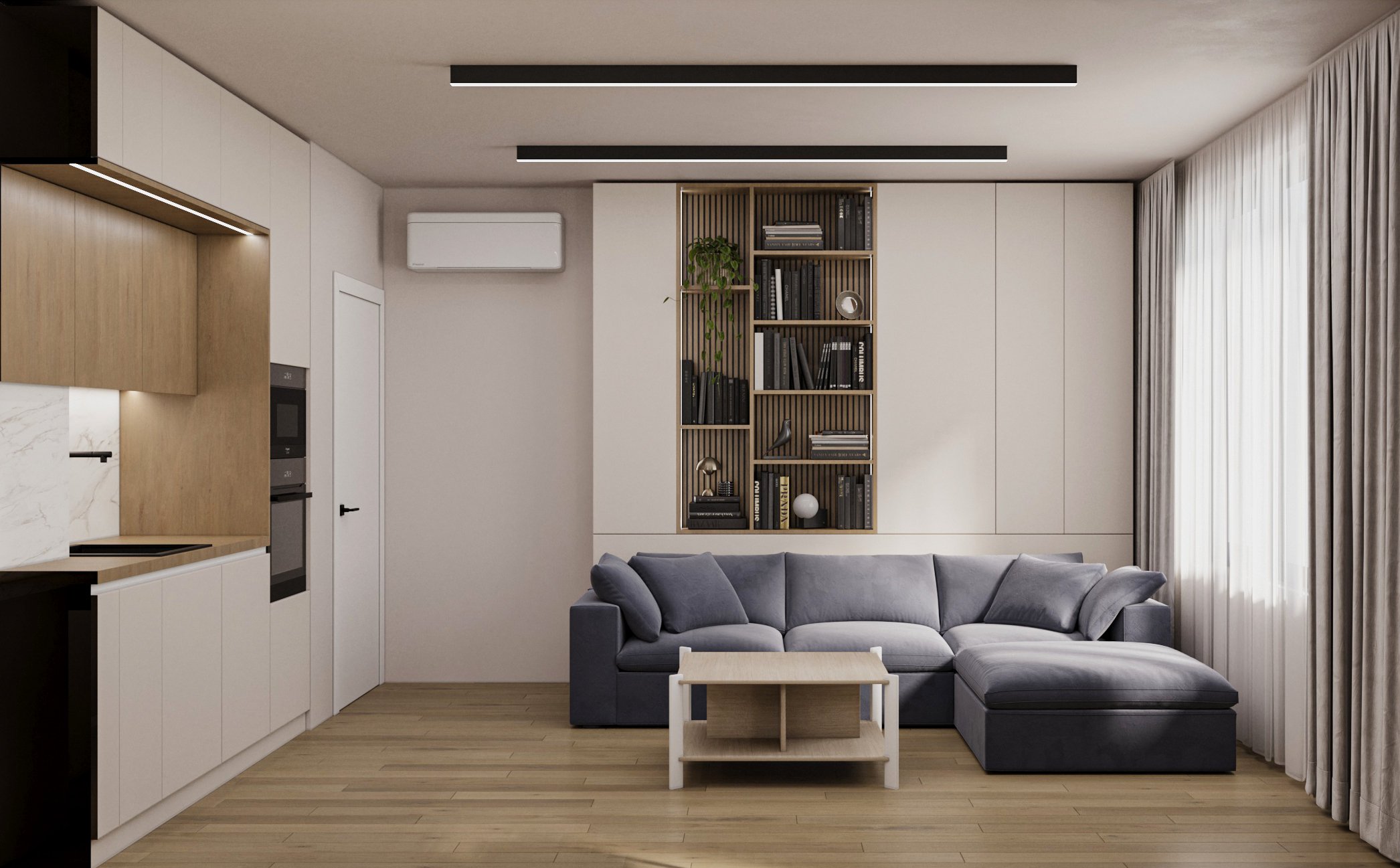 Modern living room with gray sectional sofa, white coffee table, built-in bookshelves, and kitchen area with white and wood cabinetry.