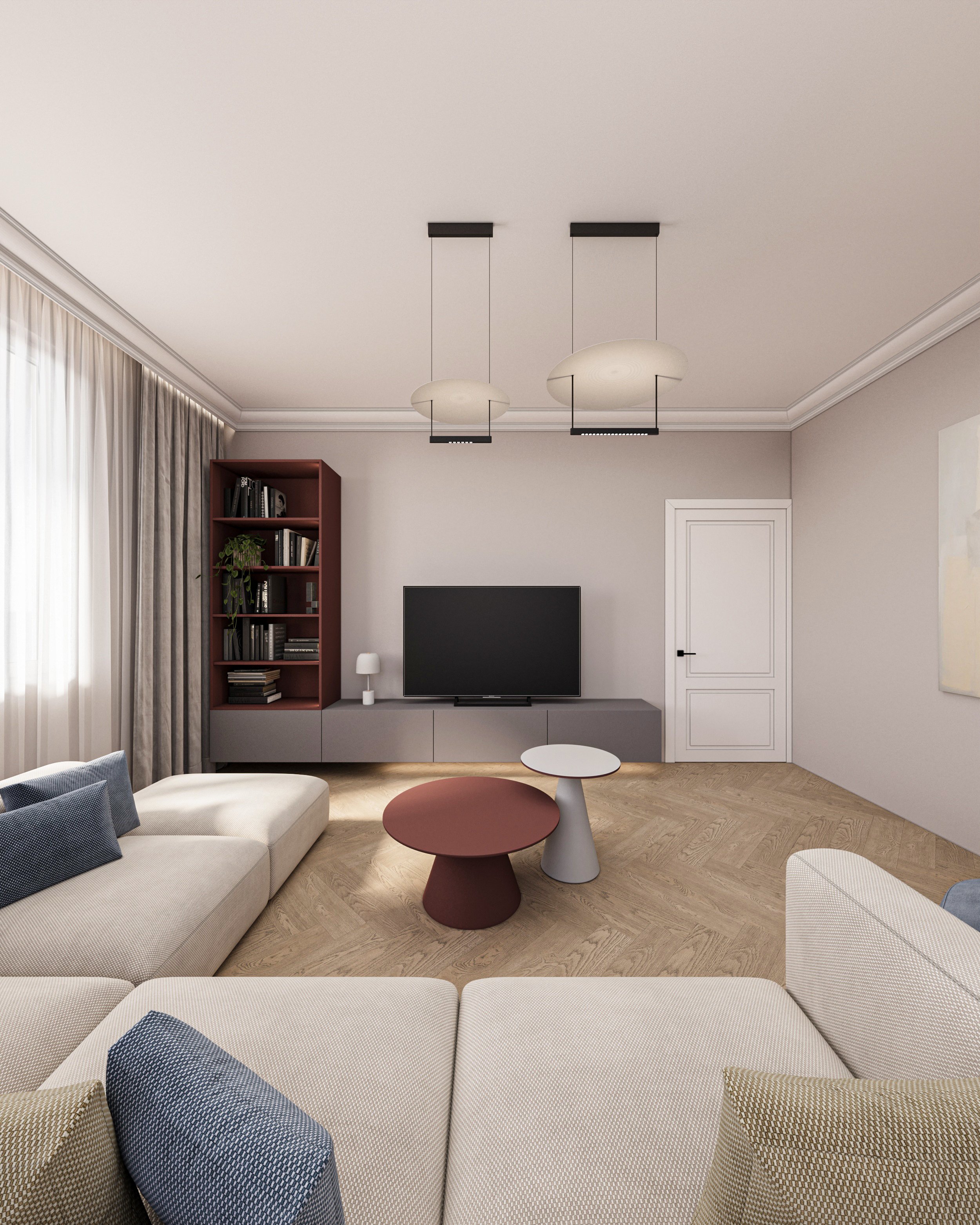 Modern living room with a large cream sectional sofa, two round coffee tables, a large flat-screen TV on a sleek gray TV stand, a tall red bookshelf with books and a plant, a small table lamp, light-colored curtains, and a ceiling with contemporary p