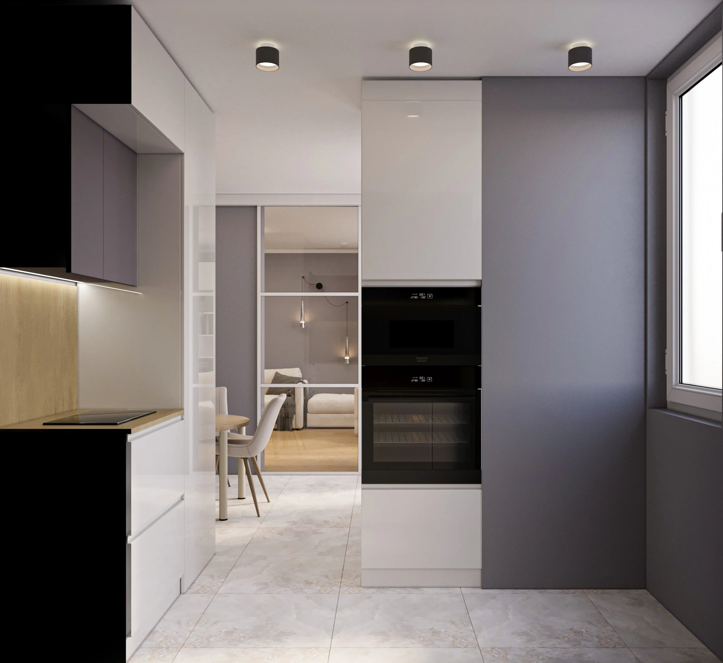 Modern kitchen with gray and white cabinetry, built-in black oven, and tiled flooring, open to a living area with a sofa and hanging pendant lights.