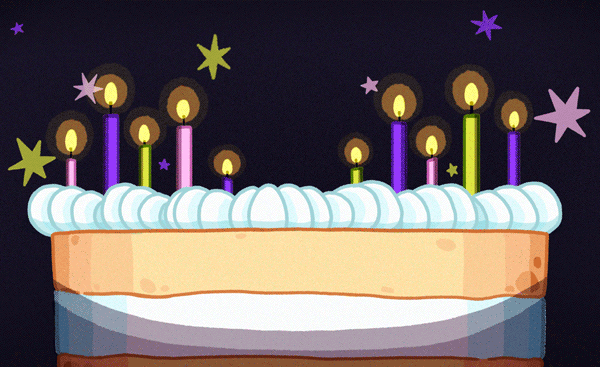 A birthday cake with lit candles, decorated with white icing and colorful stars in the background.