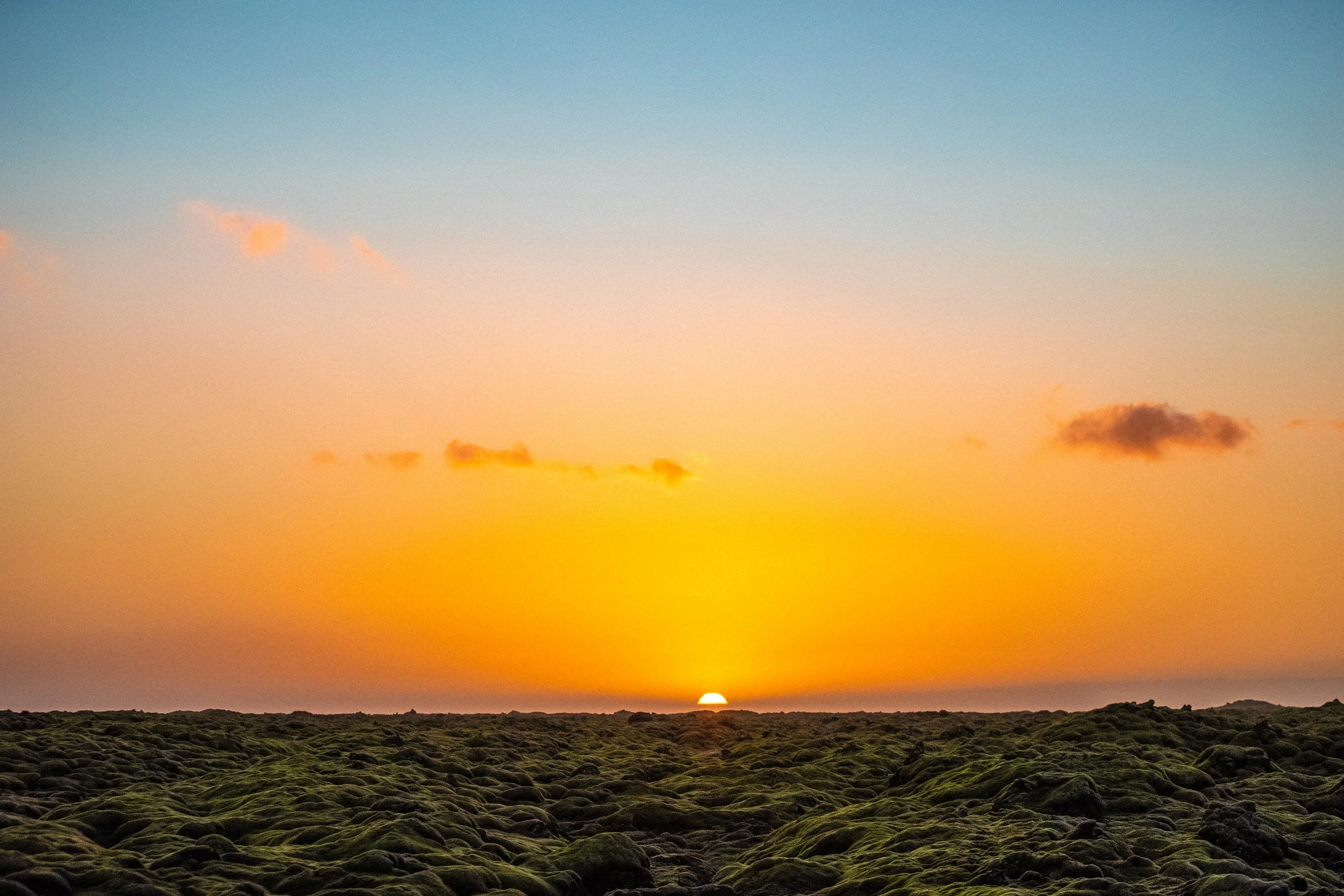 Golden Sunrise Above Icelandic Moss Landscape