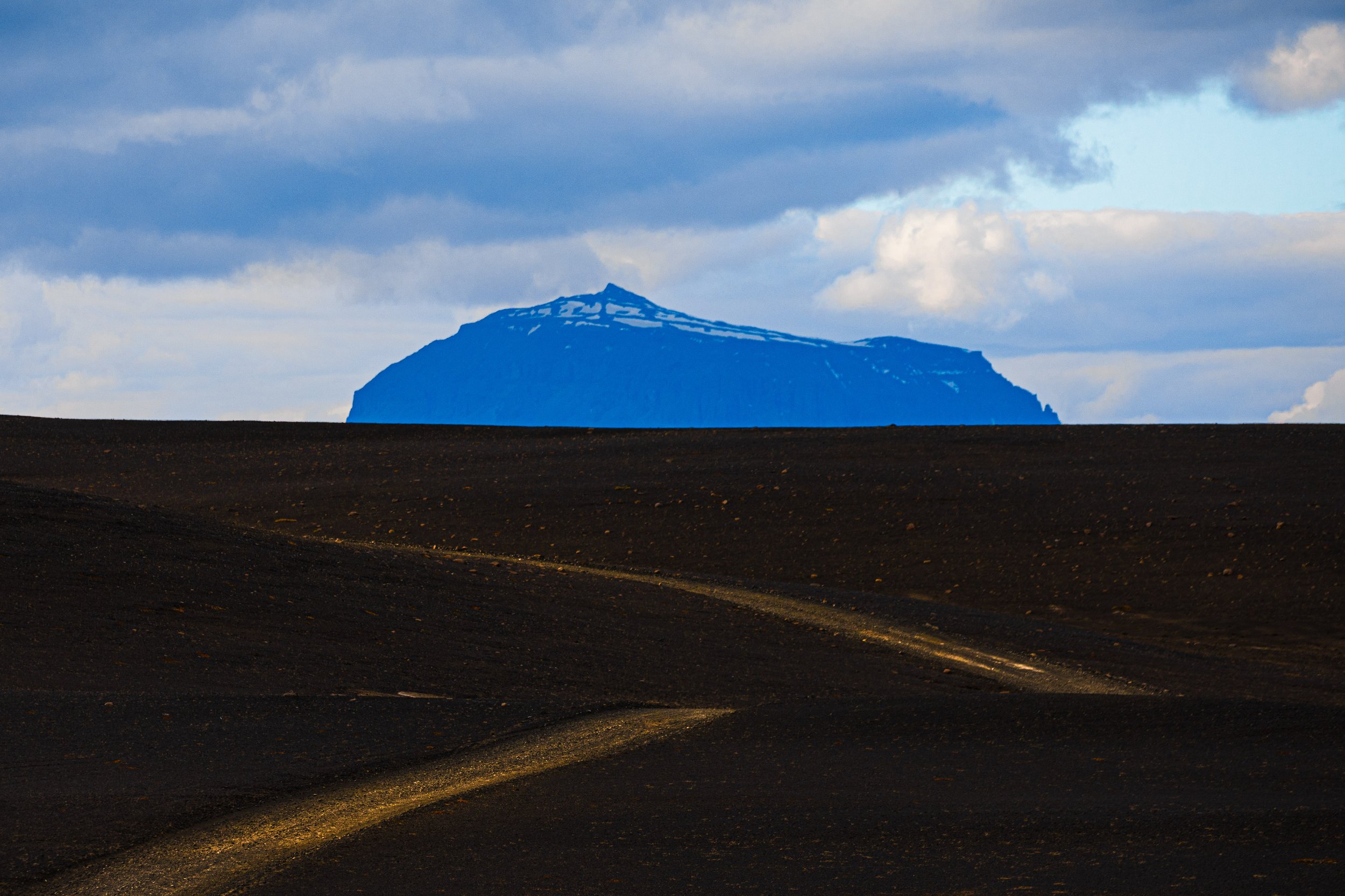 Road Through Icelandic Volcanic Plains