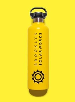 Yellow solar-powered water bottle with black cap and logo, labeled "Brooklyn SolarWorks."
