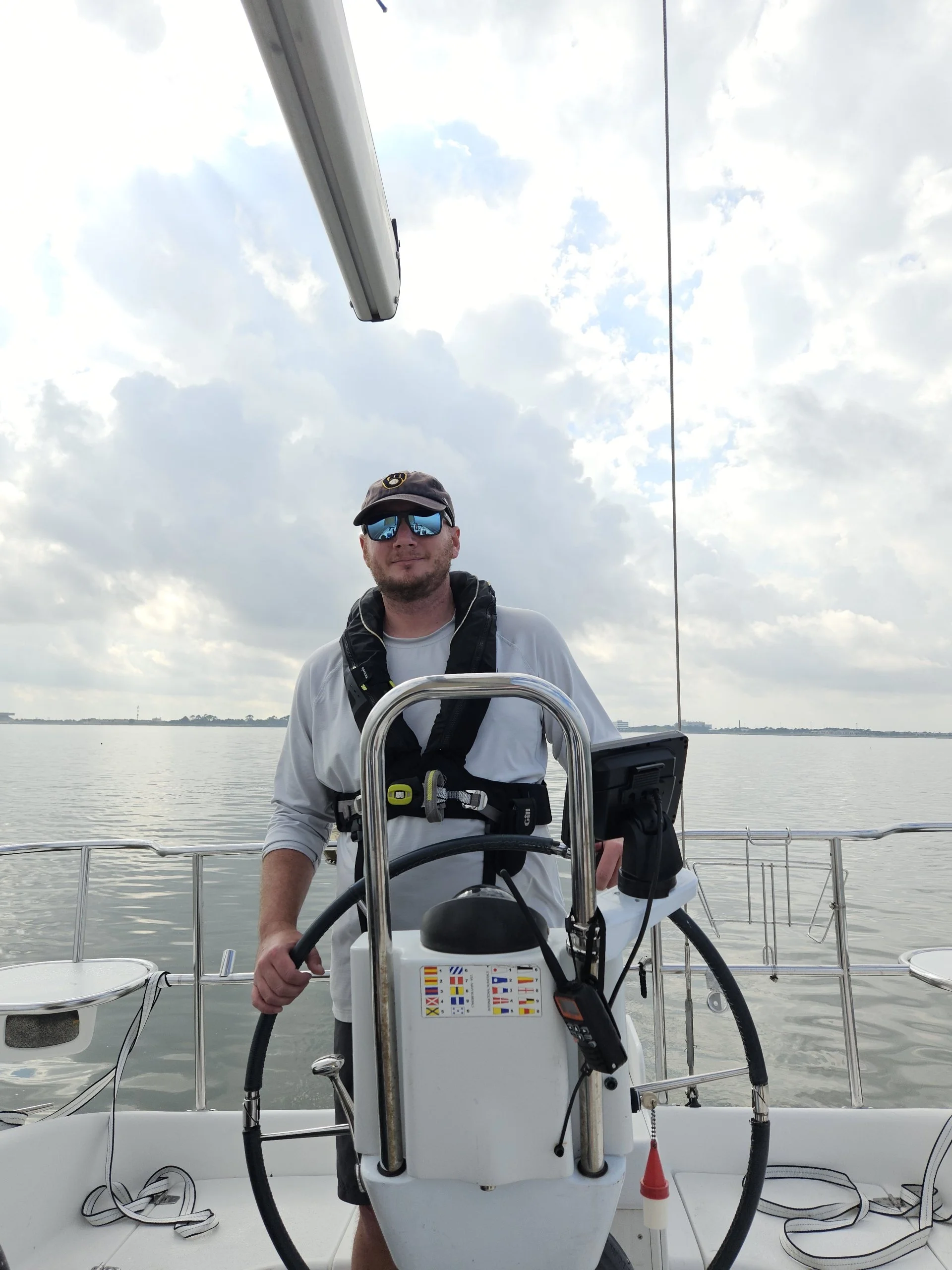 Captain Matt at the helm of Kilroy on Lake Pontchartrain, New Orleans.