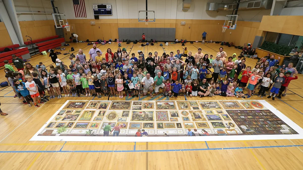 Me and the Boys and Girls Club of Marshfield, MA staff and campers with the 54,000 piece puzzle.