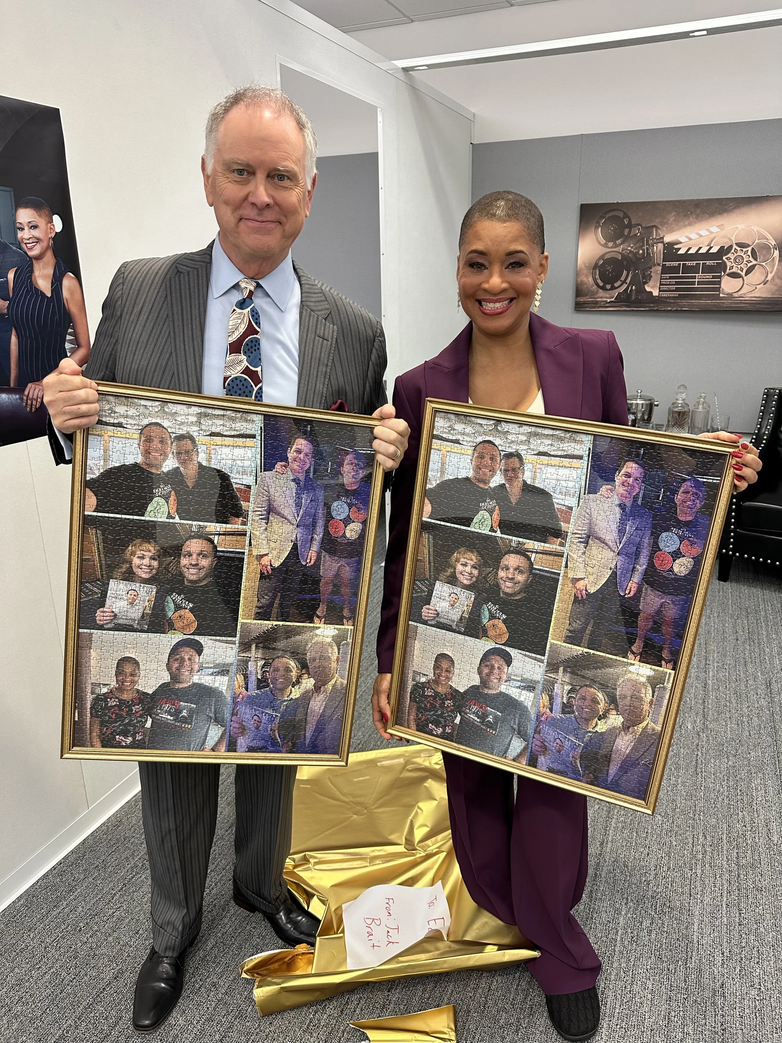 TCM hosts Eddie Muller and Jacqueline Stewart receiving their 1,000 piece puzzles created and bought by Jack Brait, aka Jack Of Puzzles, depicting him and the TCM hosts