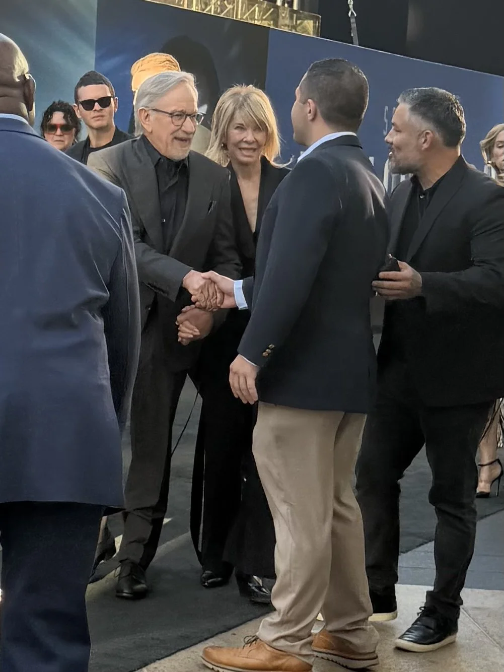 Jack Brait, aka Jack of Puzzles, meets Steven Spielberg by shaking his hand