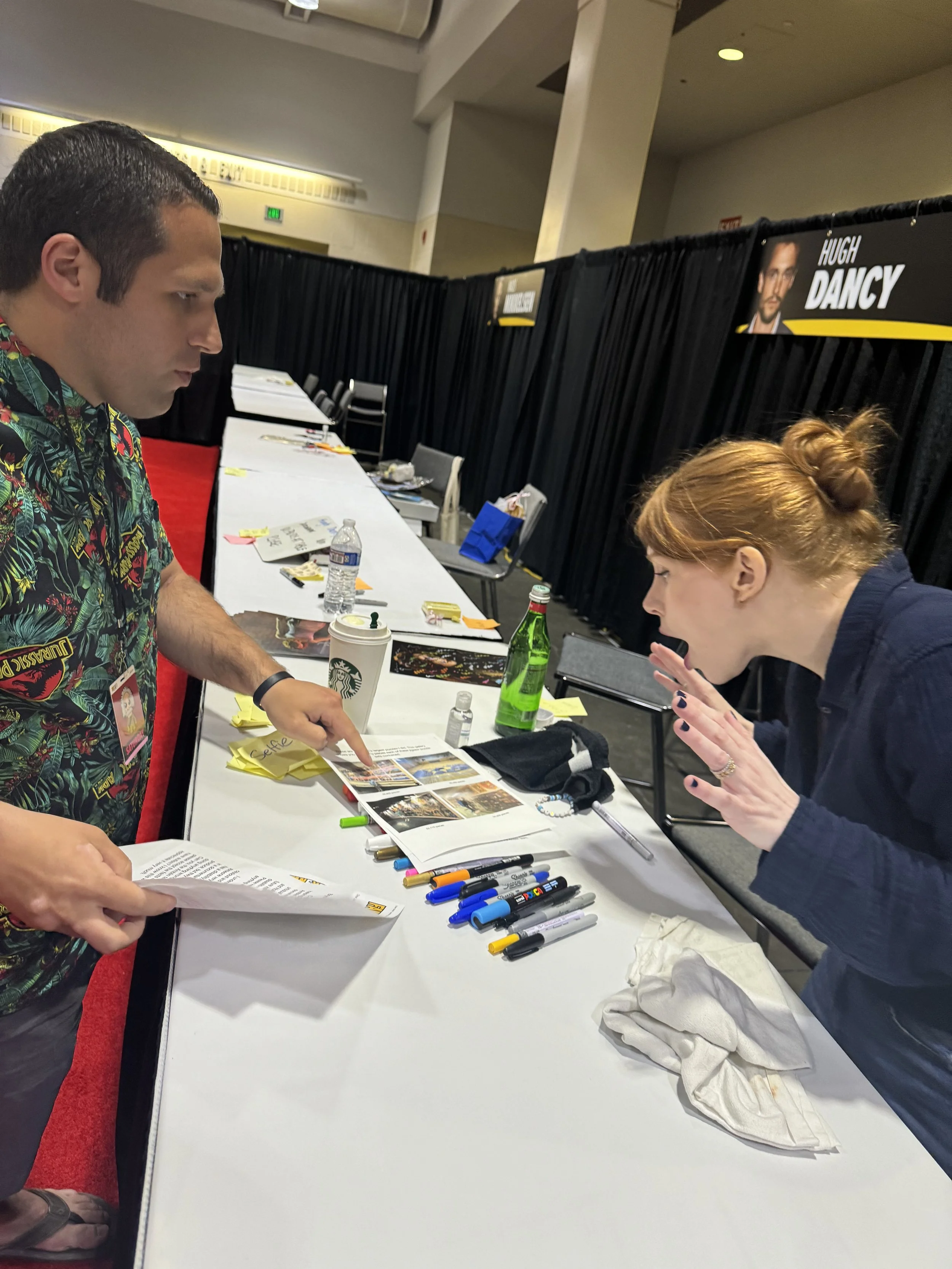 Jack Brait, aka Jack of Puzzles, impresses Bruce Dallas Howard from Jurassic World his giant puzzles at Fan Expo Boston
