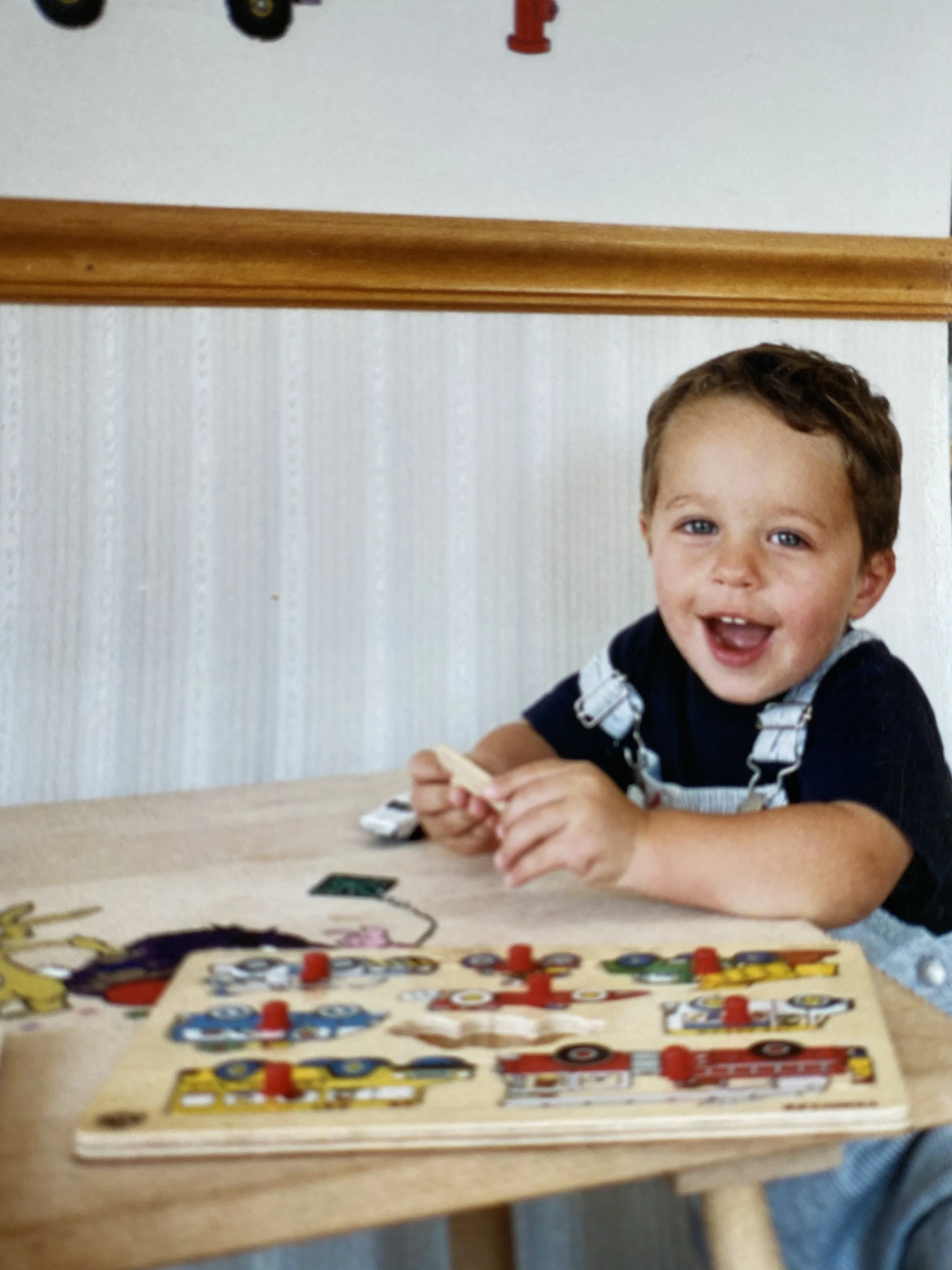 Jack Brait, aka Jack Of Puzzles, doing his very first puzzle, a wooden block puzzle