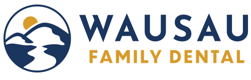Logo for Wausau Family Dental featuring a stylized image of a dolphin, mountain, and sun with the text 'WAUSAU FAMILY DENTAL'.