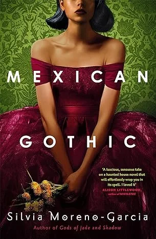 Cover of the book 'Mexican Gothic' by Silvia Moreno-Garcia. It features a woman in an off-the-shoulder, dark red dress with a green patterned background.