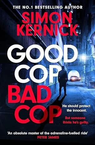 Book cover for 'Good Cop Bad Cop' by Simon Kernick, featuring a city alleyway scene with a man walking in the rain.