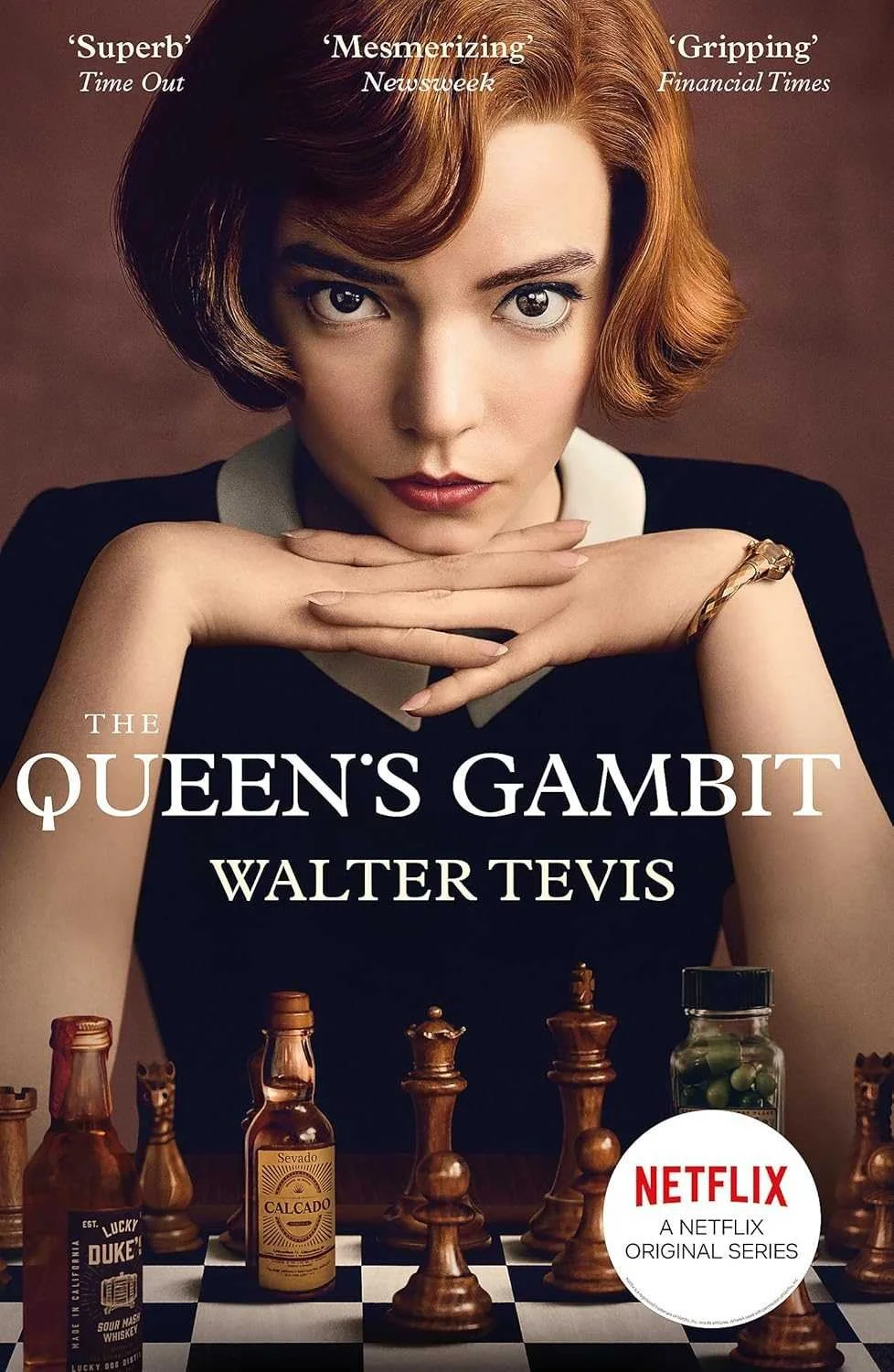 Close-up of a woman with red hair and fair skin, resting her chin on her hands, looking directly at the camera. There are chess pieces and bottles of liquor on a chessboard in front of her. The text includes quotes praising the series and shows the title "The Queen's Gambit" by Walter Tevis, with a Netflix logo indicating it's a Netflix original series.