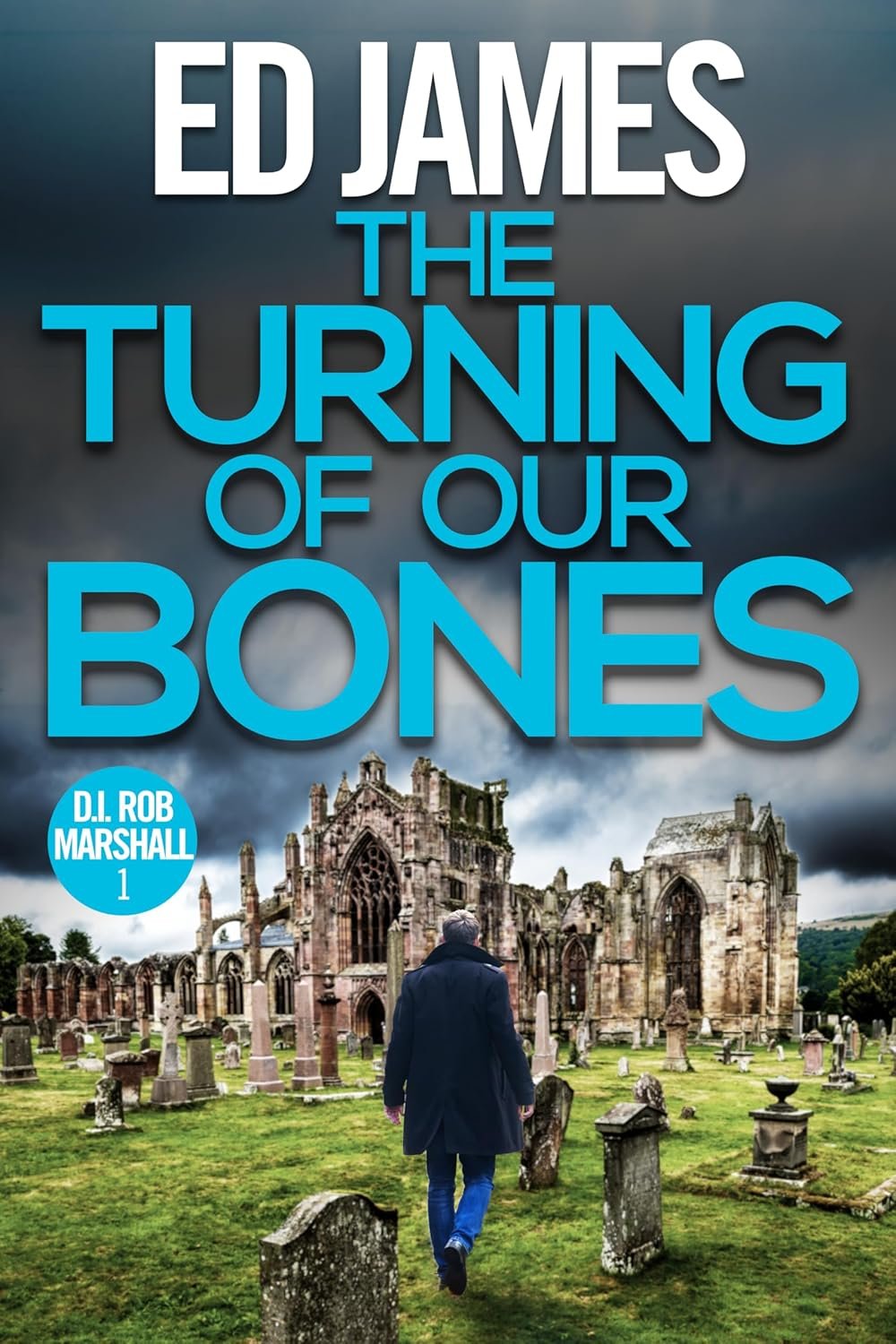 Book cover featuring a man walking through a graveyard with old gravestones, and a worn, stone church ruins in the background, under a dark, cloudy sky. The title reads 'The Turning of Our Bones' in large blue letters, with the author's name 'Ed James' at the top and a blue circle indicating 'D.I. Rob Marshall 1'.