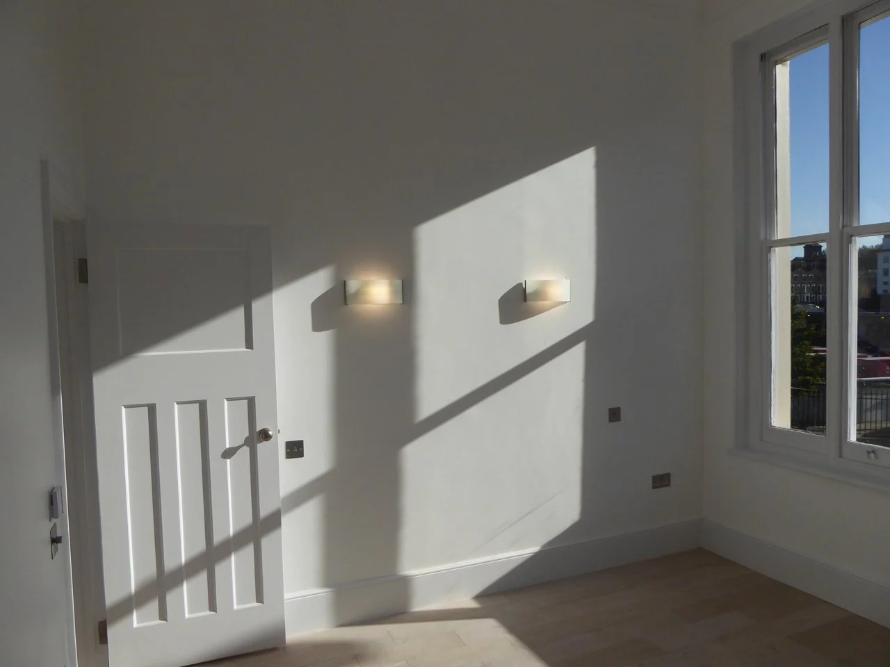 Retained original doors, windows, and skirting boards.