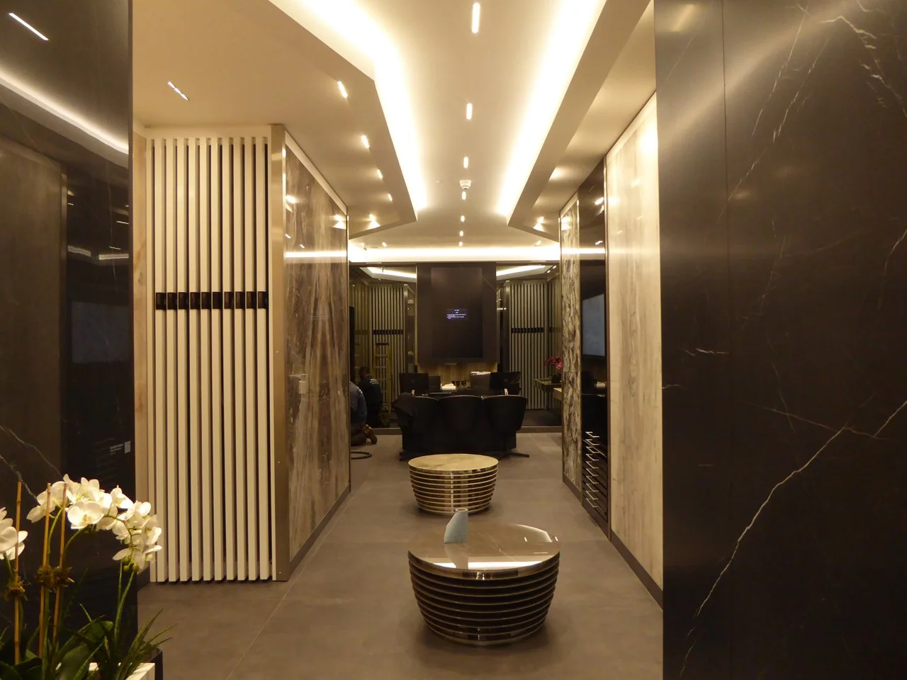 The main display area showing coffered ceiling, LED lighting and concealed A/C system