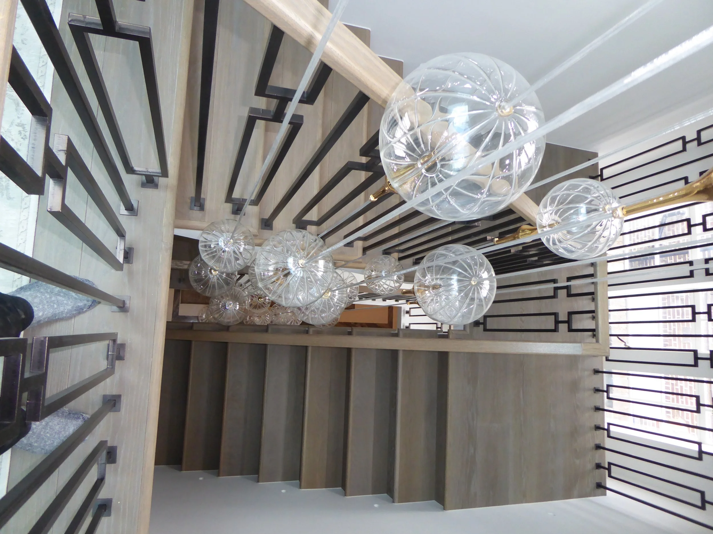Main stairwell with purpose made light feature