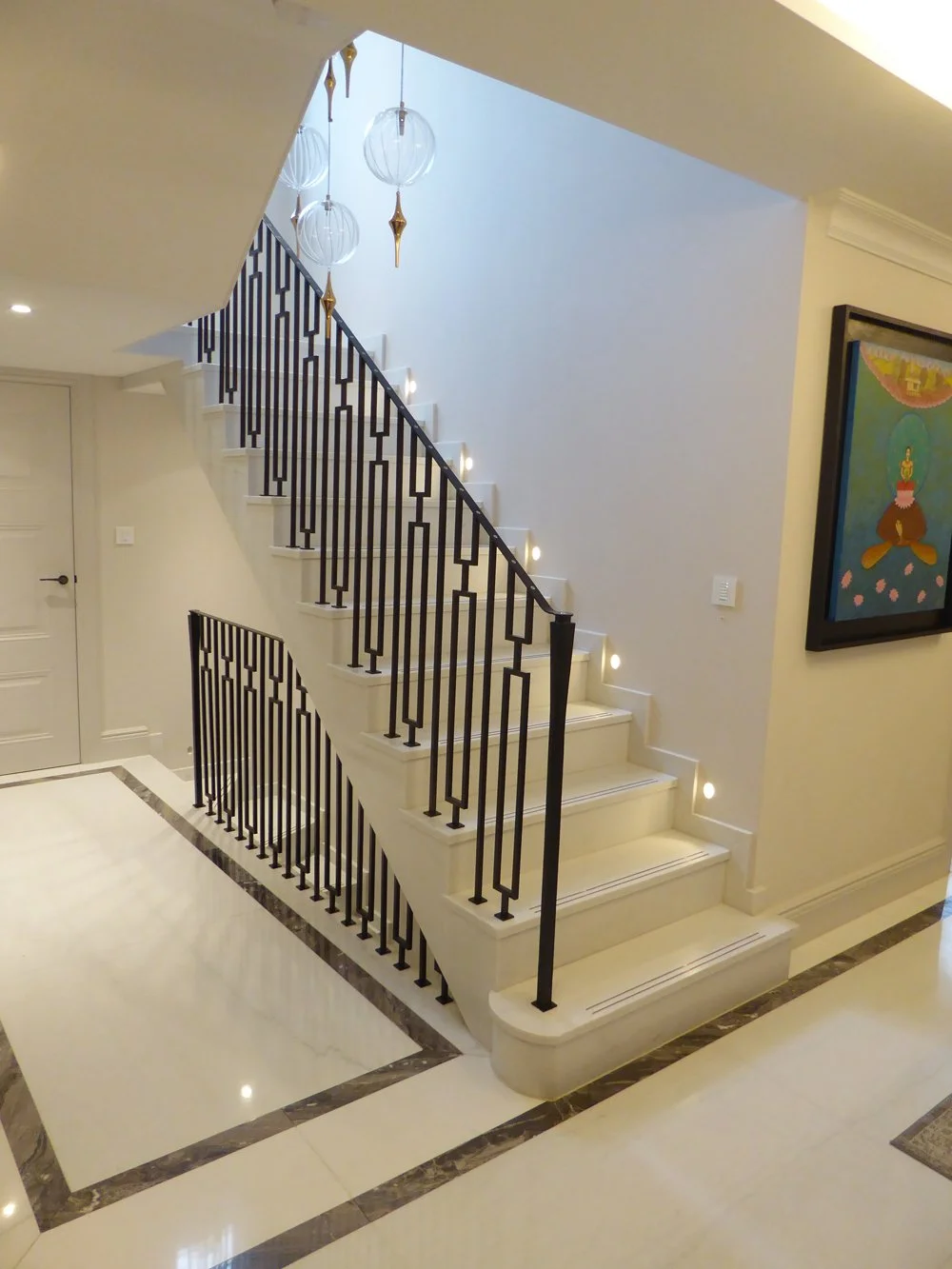 New steel framed and marble clad stair
