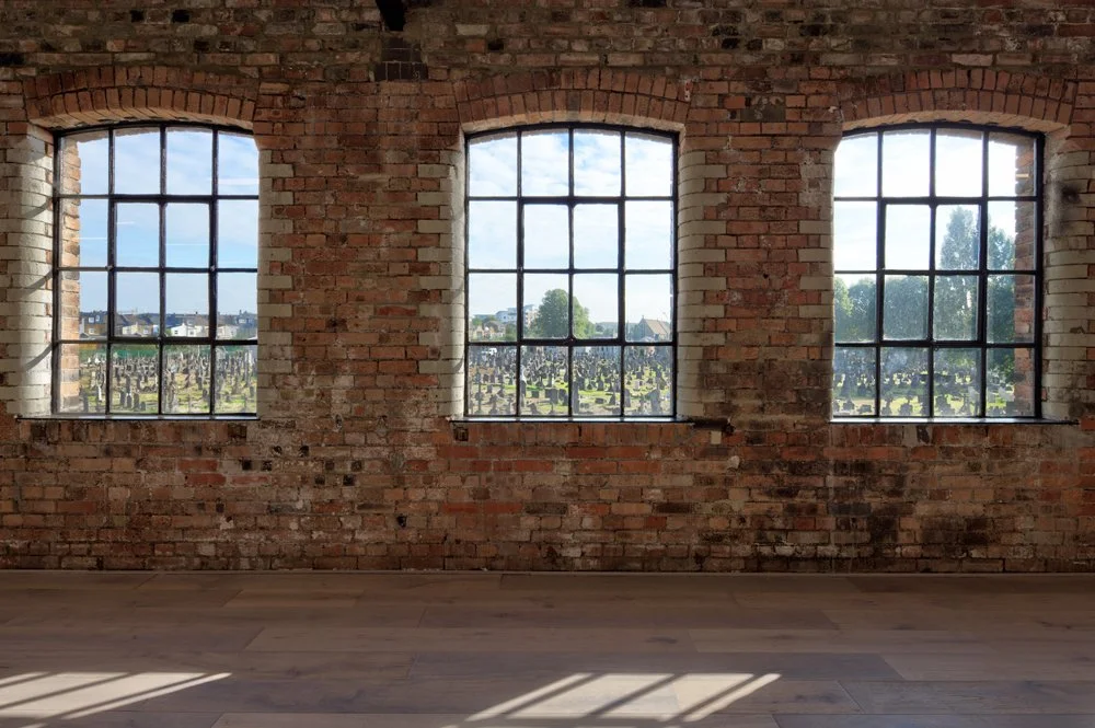 Restored Crittall windows with central pivot panels