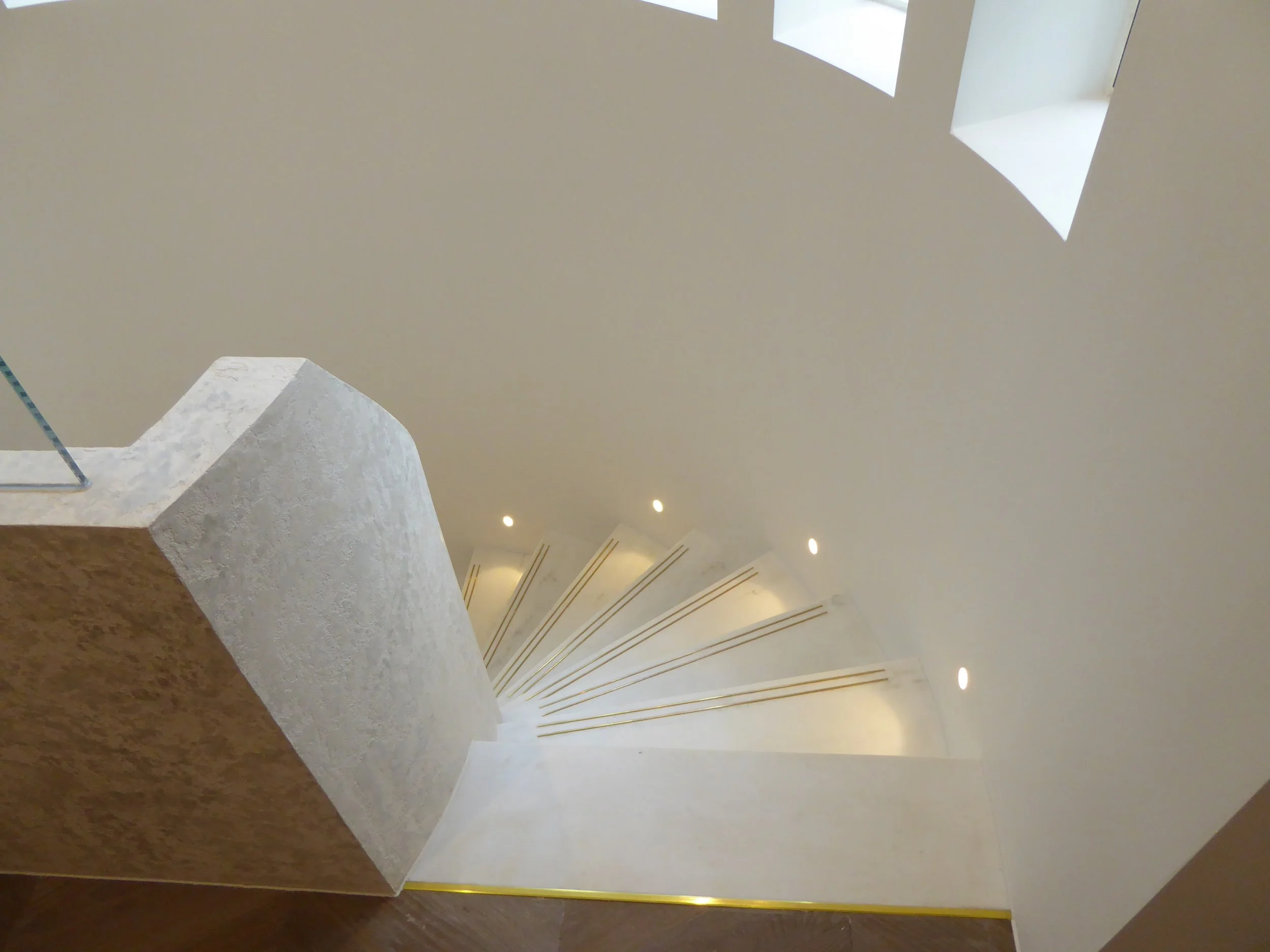 Cantilevered spiral stair to new basement