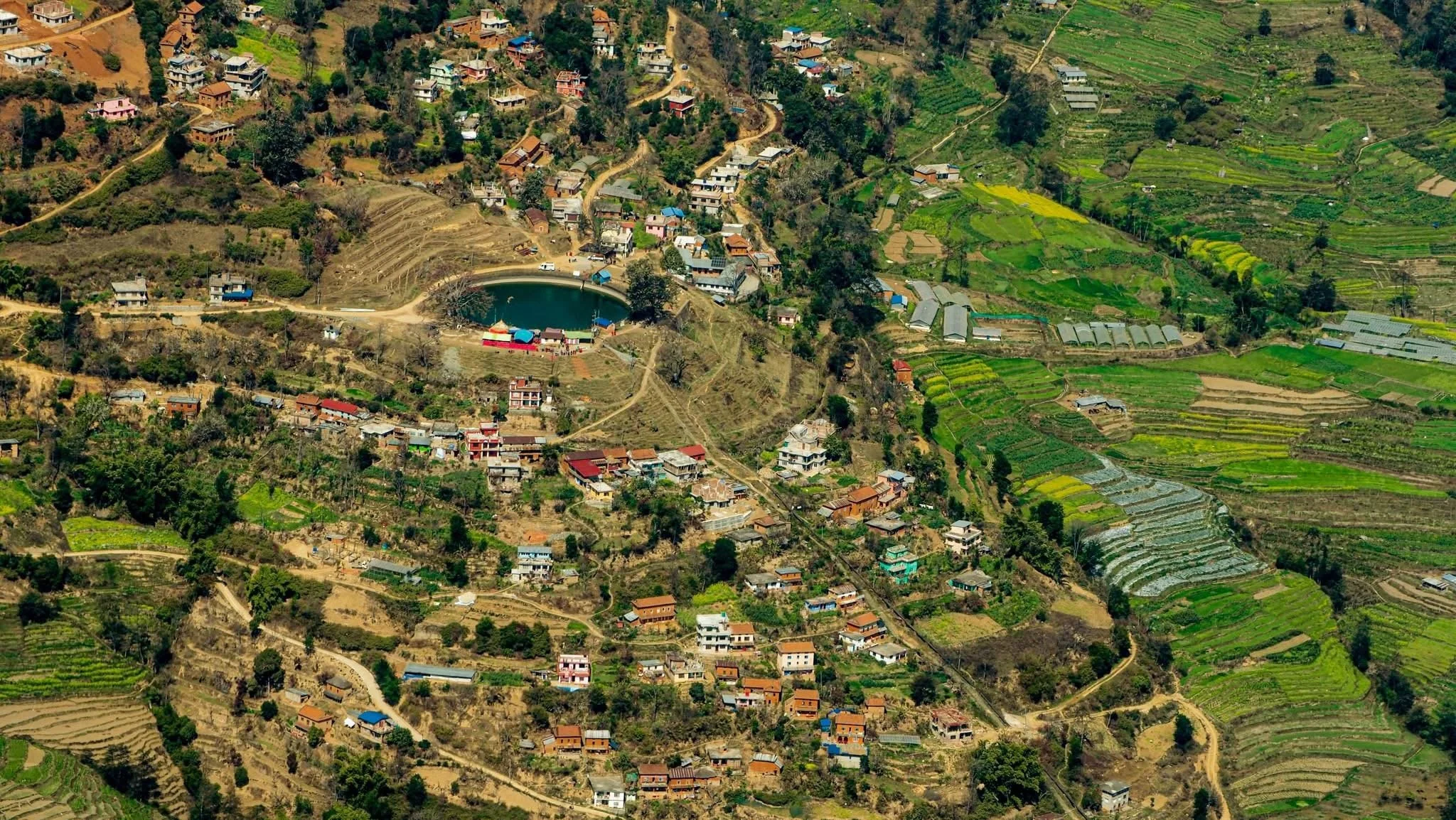Outside Kathmandu, roaming my school-day hills. Foraging for Lapsi, talking to villagers, stopping at the hilltop monastery. The mountain wall held guava and orange trees. A landscape where every path lead back to a self I still recognize.