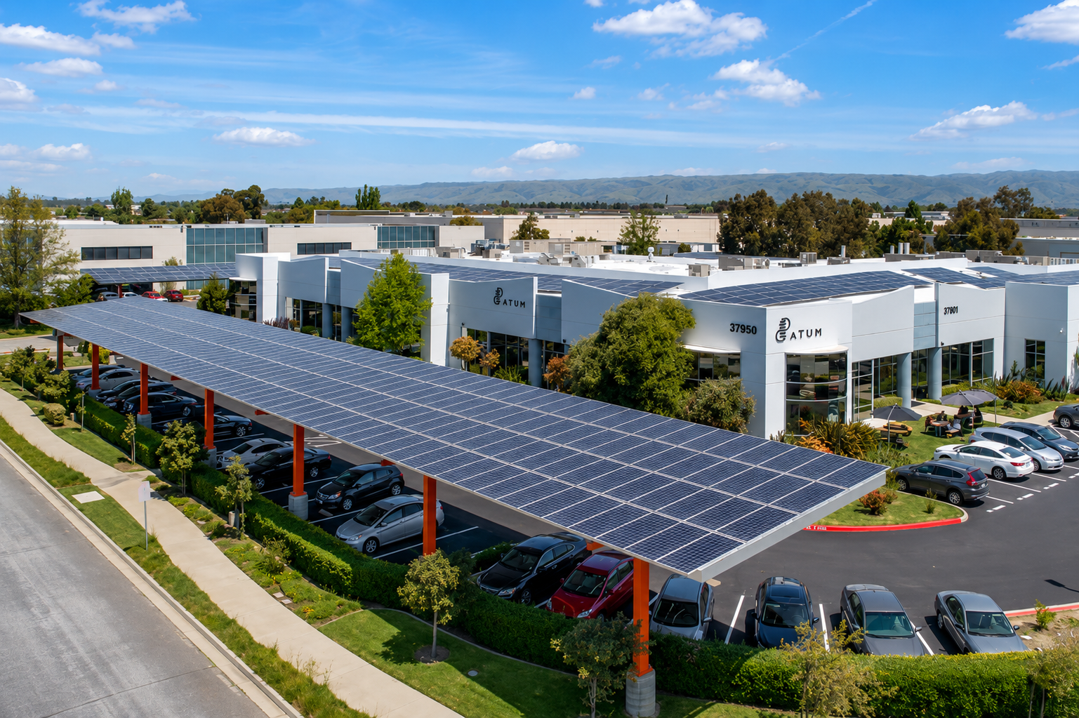Business building with solar panels on roof and parking spots
