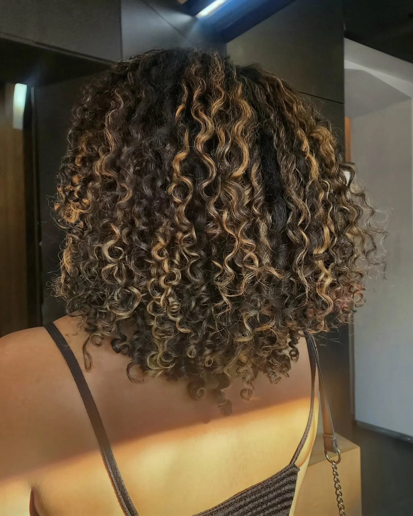 "Golden hour, but make it *permanent* ✨☀️ Elevate your look with a stunning caramel balayage! ⁠
Book your appointment now and let your hair shine. ✨💇&zwj;♀️⁠
.⁠
Ask for Sade⁠
@excentriconkloof⁠
@intrinsicurlyme⁠
( #📷 @sade_chair_1.0 )