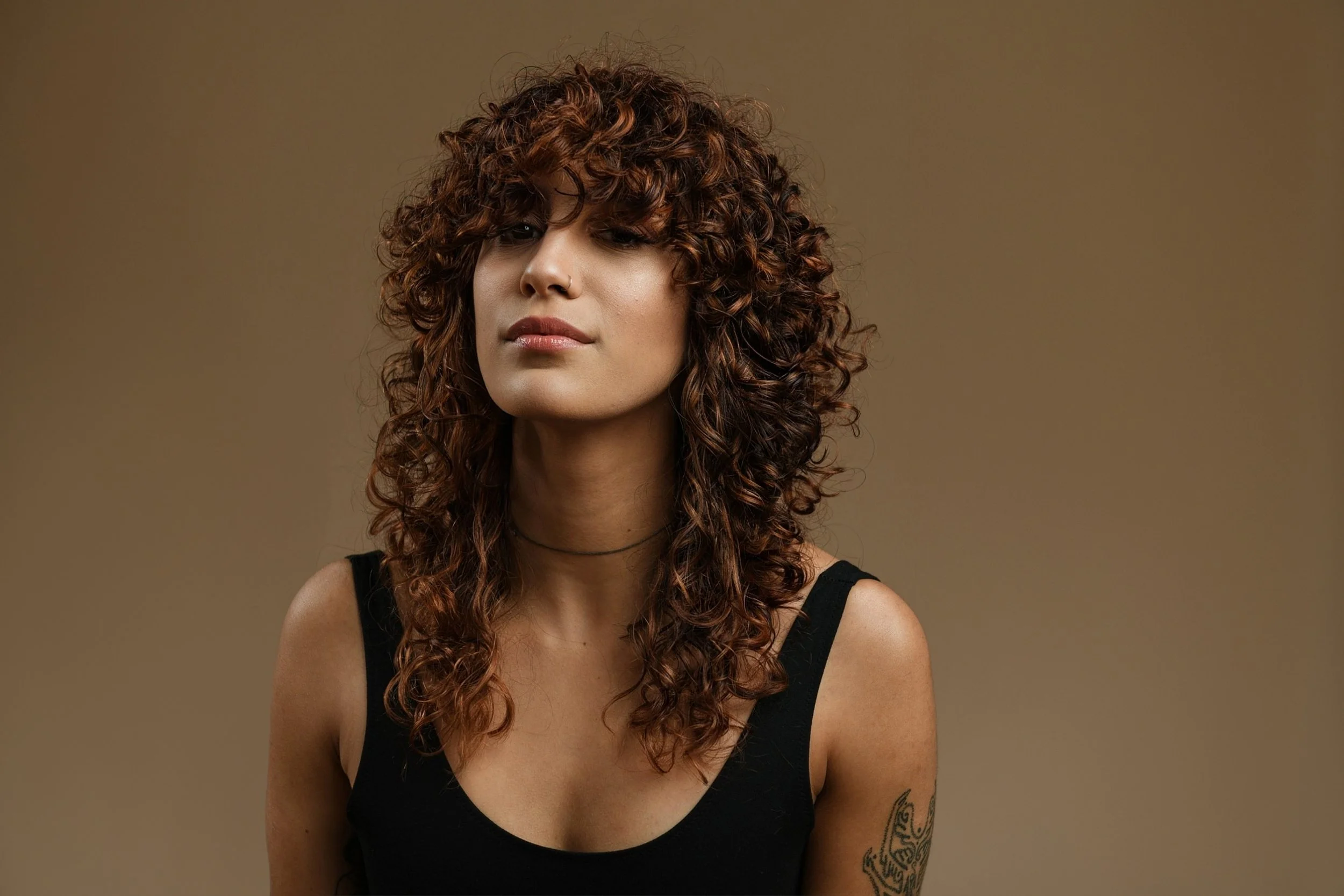 Curly Hairstyle with bangs