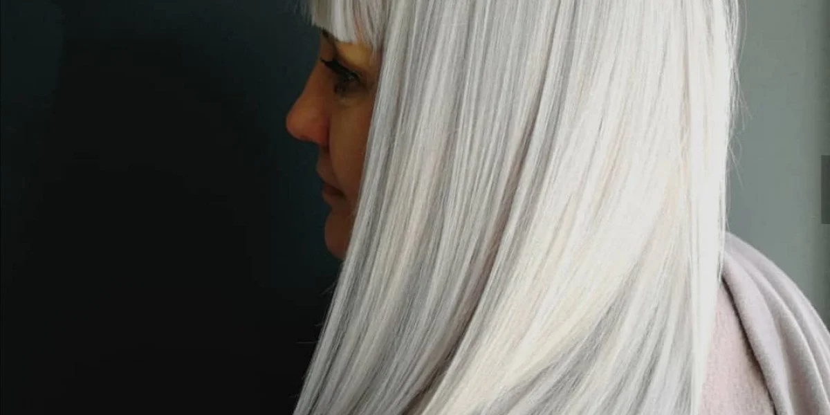 Close-up of wavy, blonde hair.