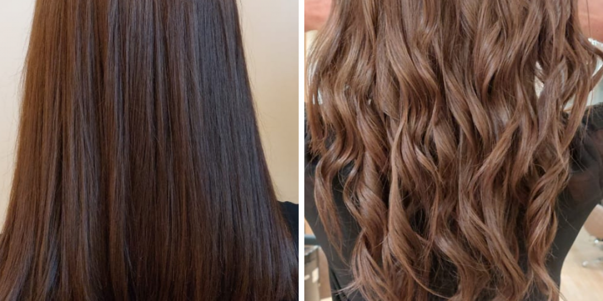 Close-up of long, wavy, strawberry blonde hair with loose curls.