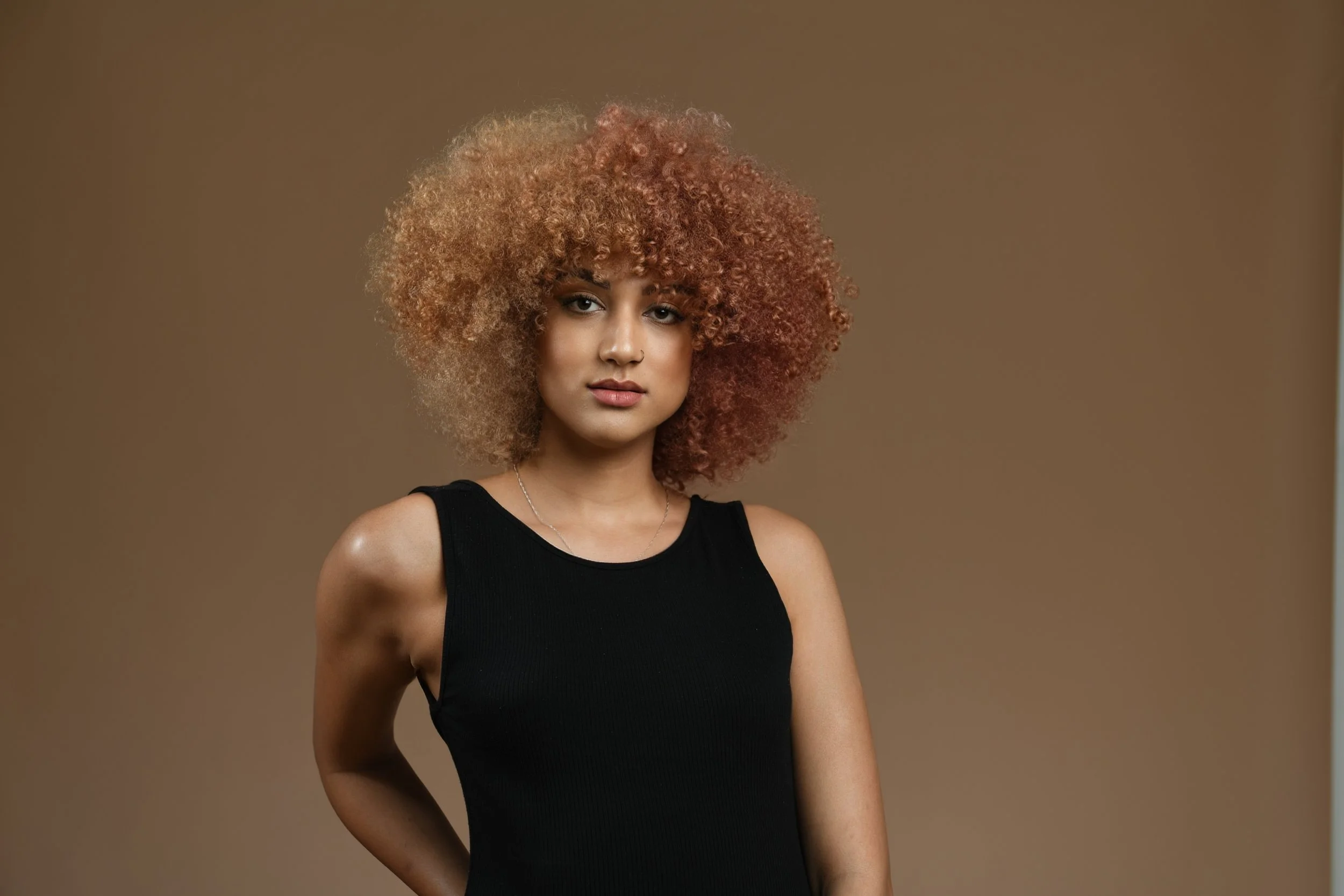 Curly haircut with fringe