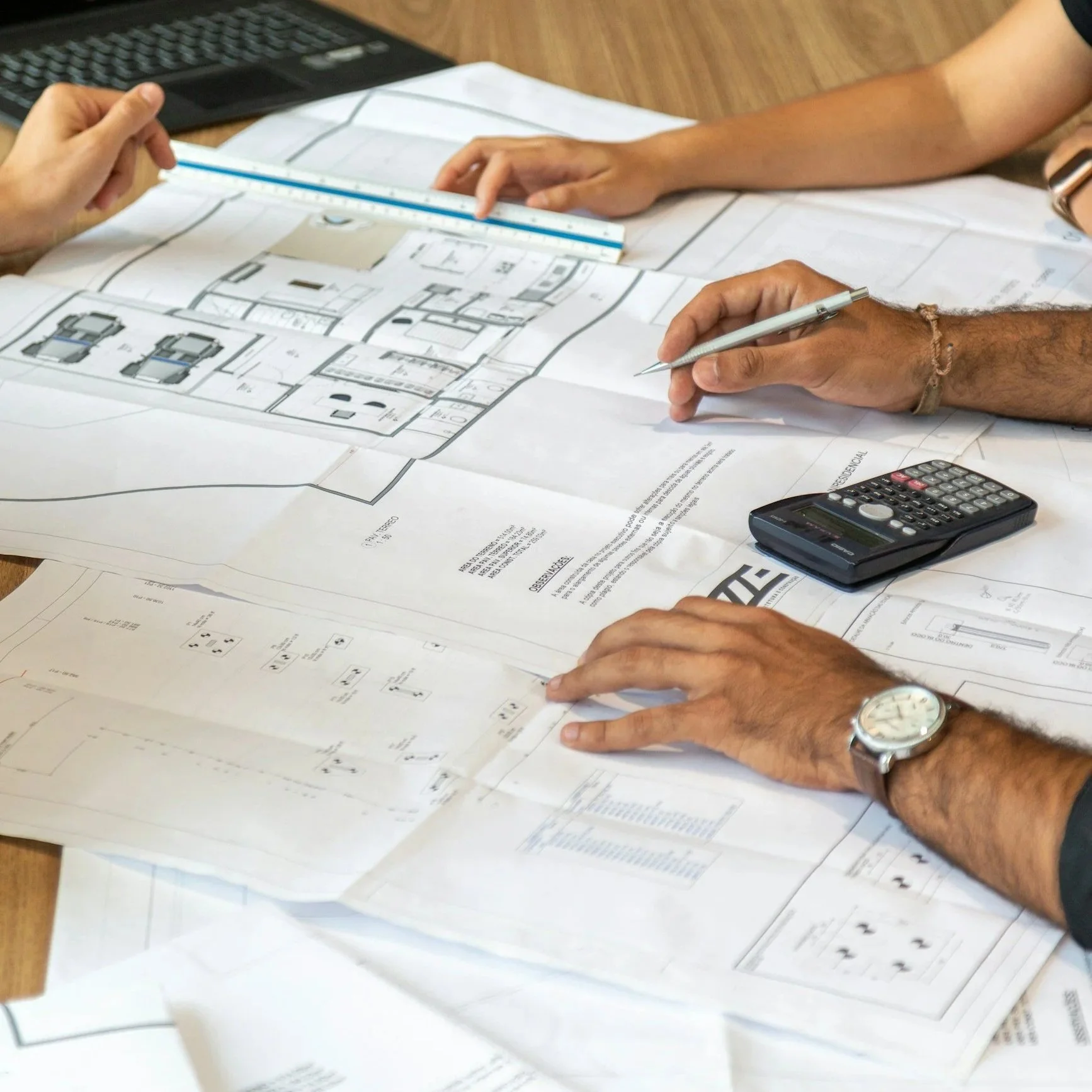 Building code consultant working with clients on a residential construction project.