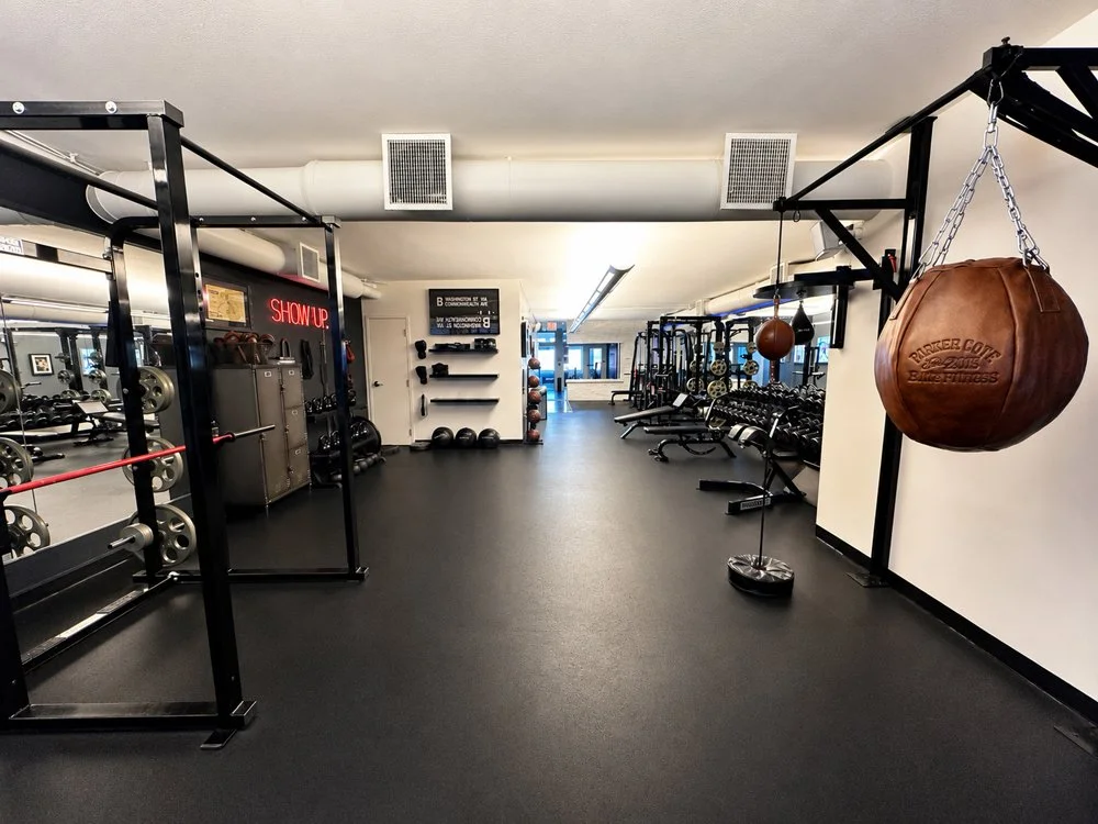 Showcasing the boxing section and large training space at Parker Cote Elite Fitness on Newbury Street