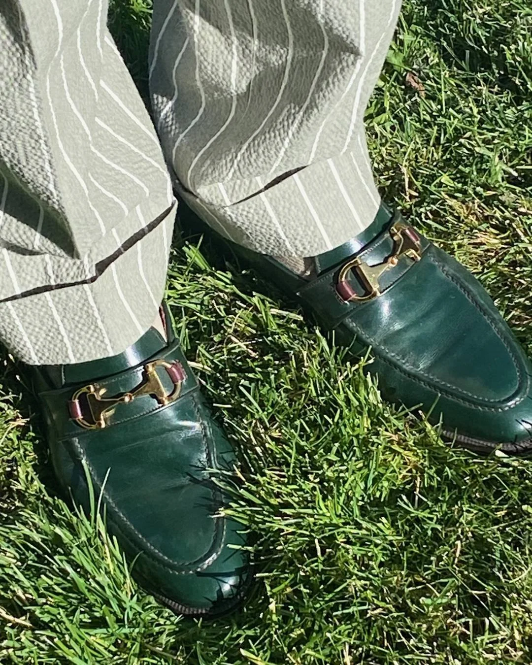Green horsebit loafers