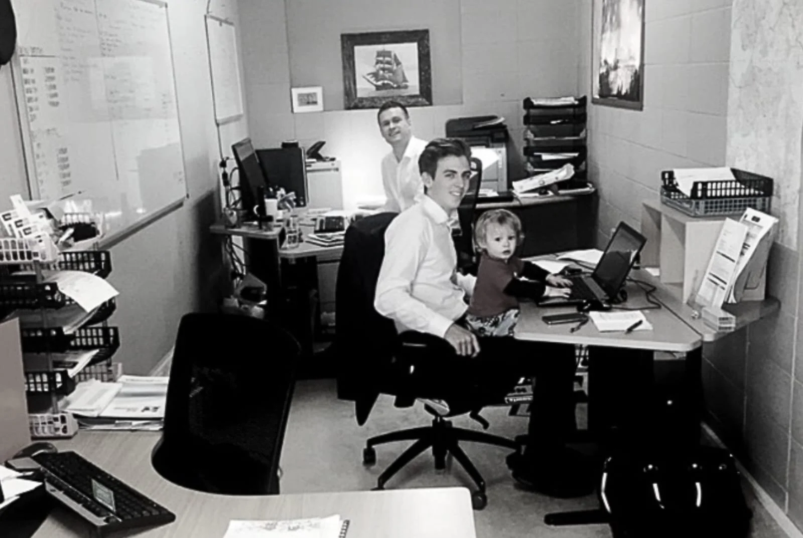 Ben Macky in the early days of building Wallace, working from a garage before growing the business into a leading boutique real estate brand