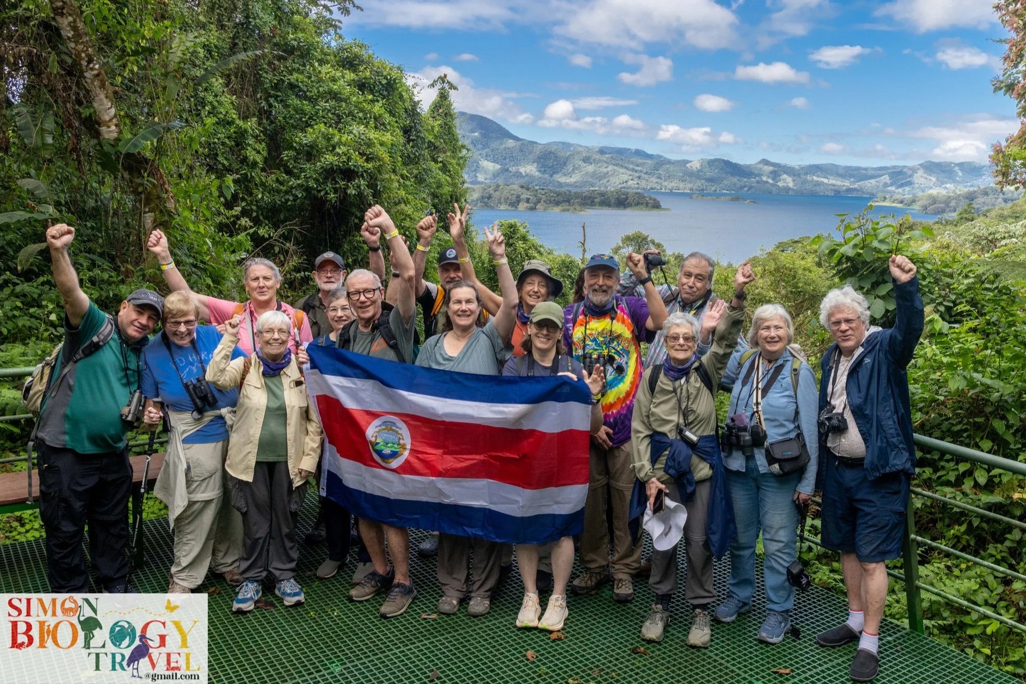 Group of people holding flag