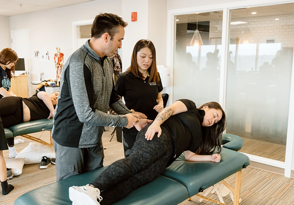 Image with a colective massage therapy classroom on Evolve College building