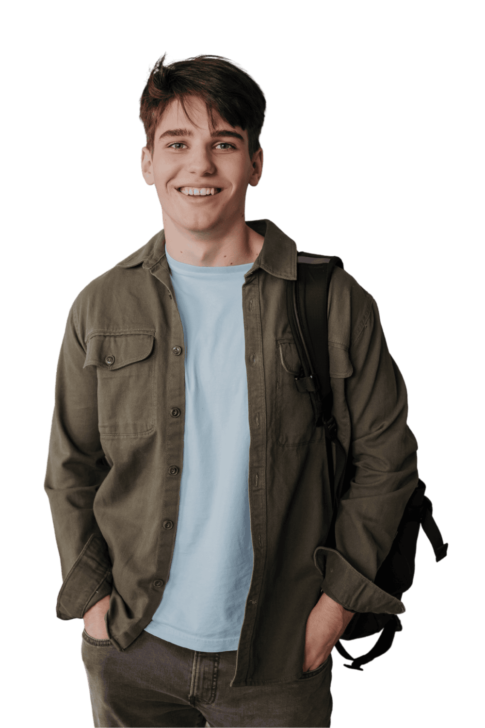 A young man smiling, wearing a green jacket over a light blue t-shirt, carrying a backpack, standing against a black background.