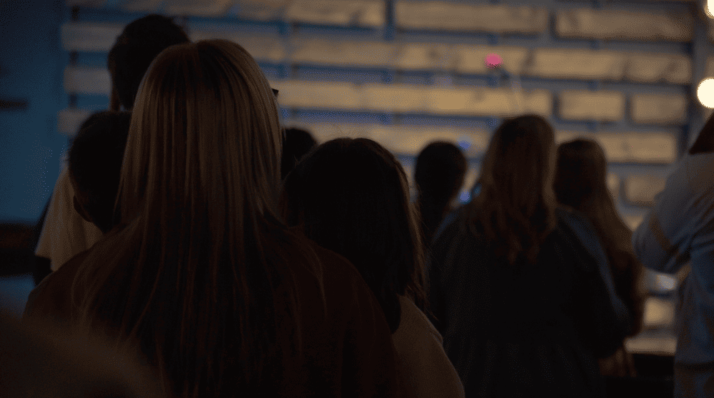 worship service showing people from behind looking at the stage during one of the biblical feast dates