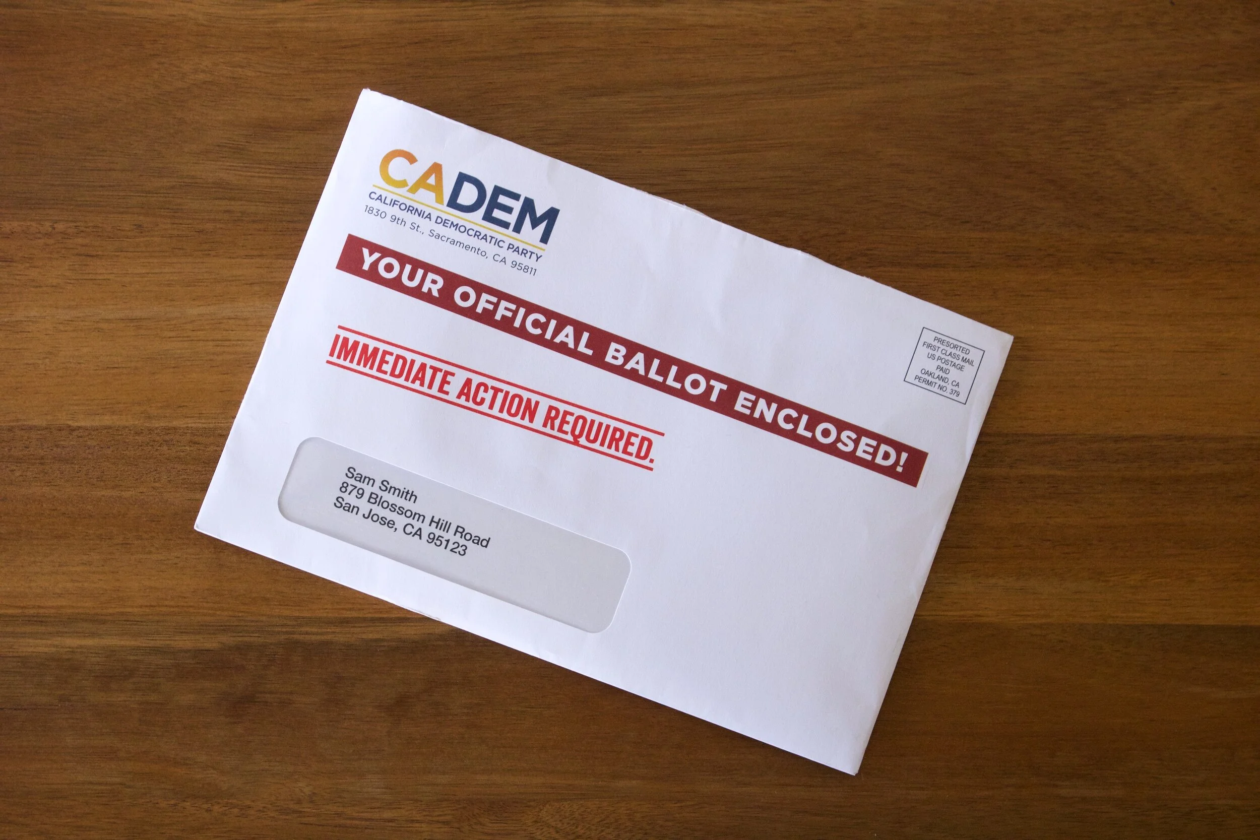 ADEM 2021 envelope on desk downsampled.jpg