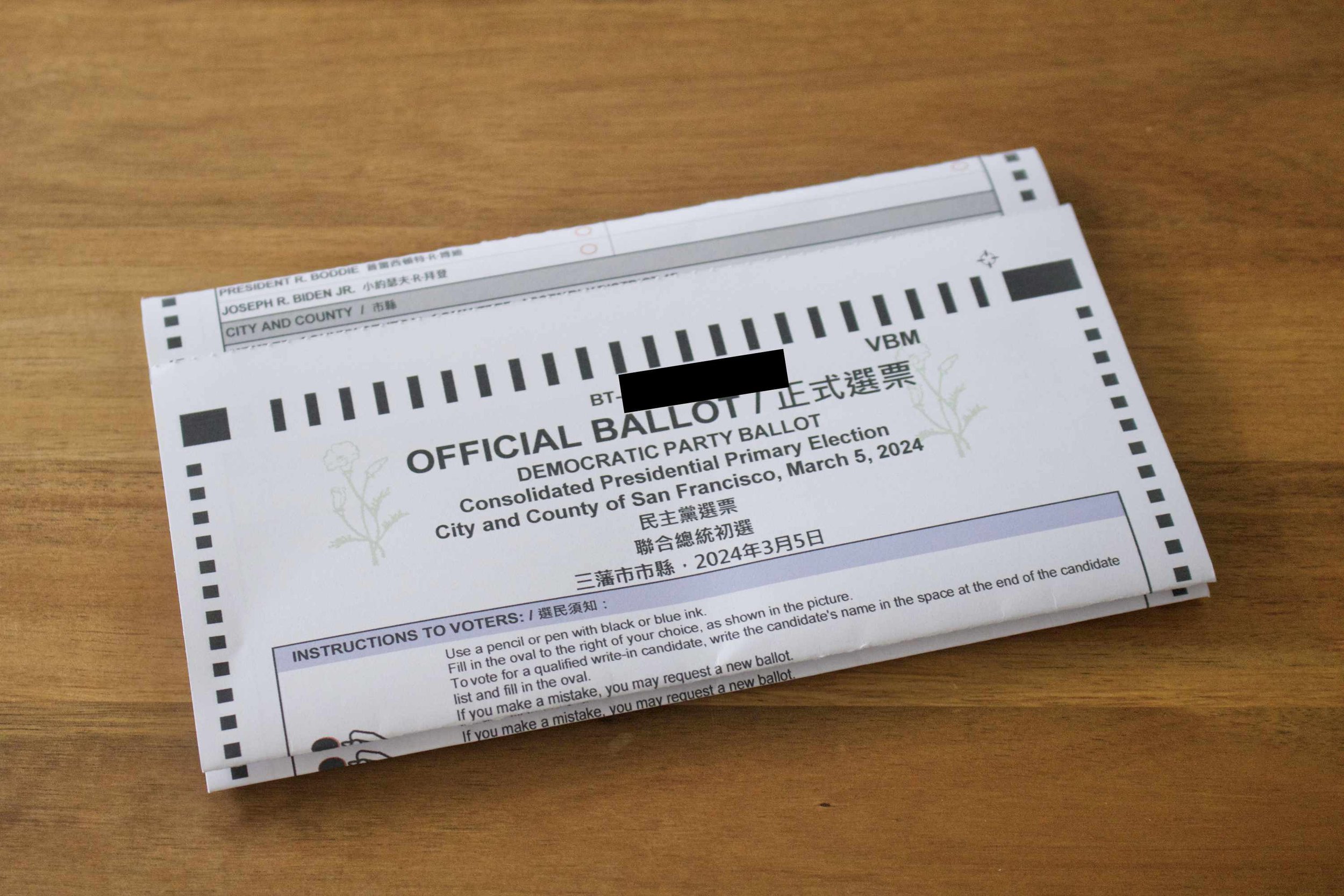 Ballot cards now stacked separately, each folded card on top of the others, with the stub removed from the top of each one.