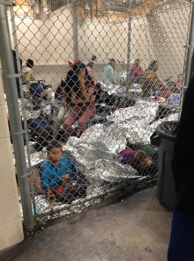 A cage containing a number of detained people, including children, and numerous Mylar blankets. (Photo credit: Rep. Jackie Speier)