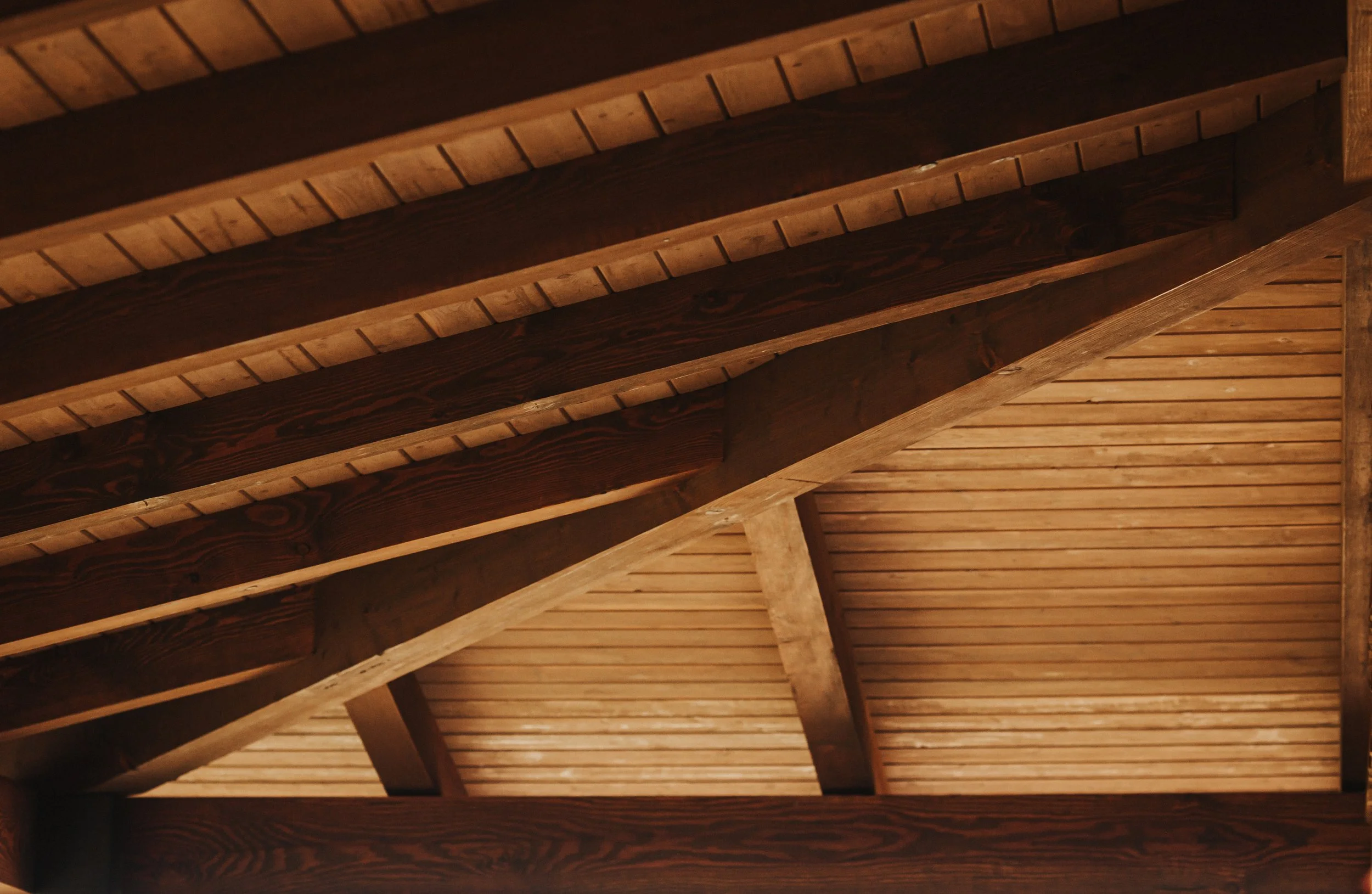Wooden ceiling with exposed beams.