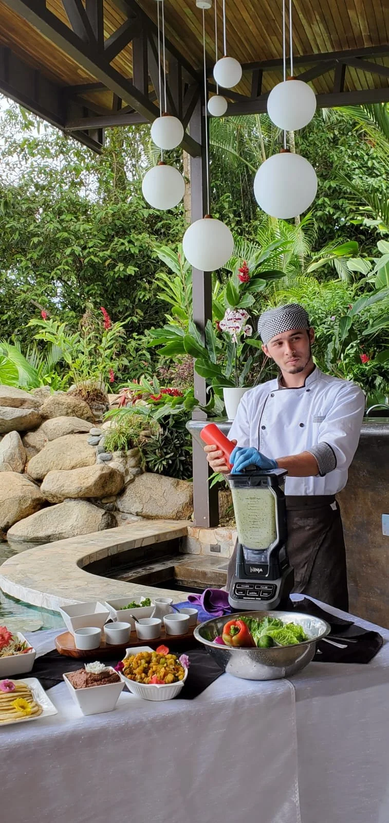 Cooking demo at women's yoga retreat in Costa Rica