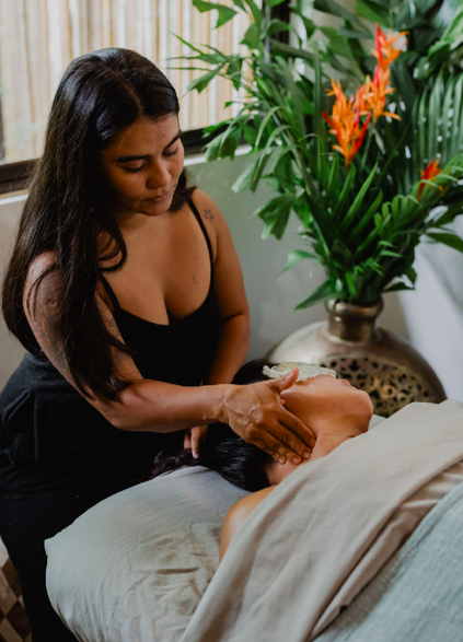 woman getting a spa service on a yoga retreat