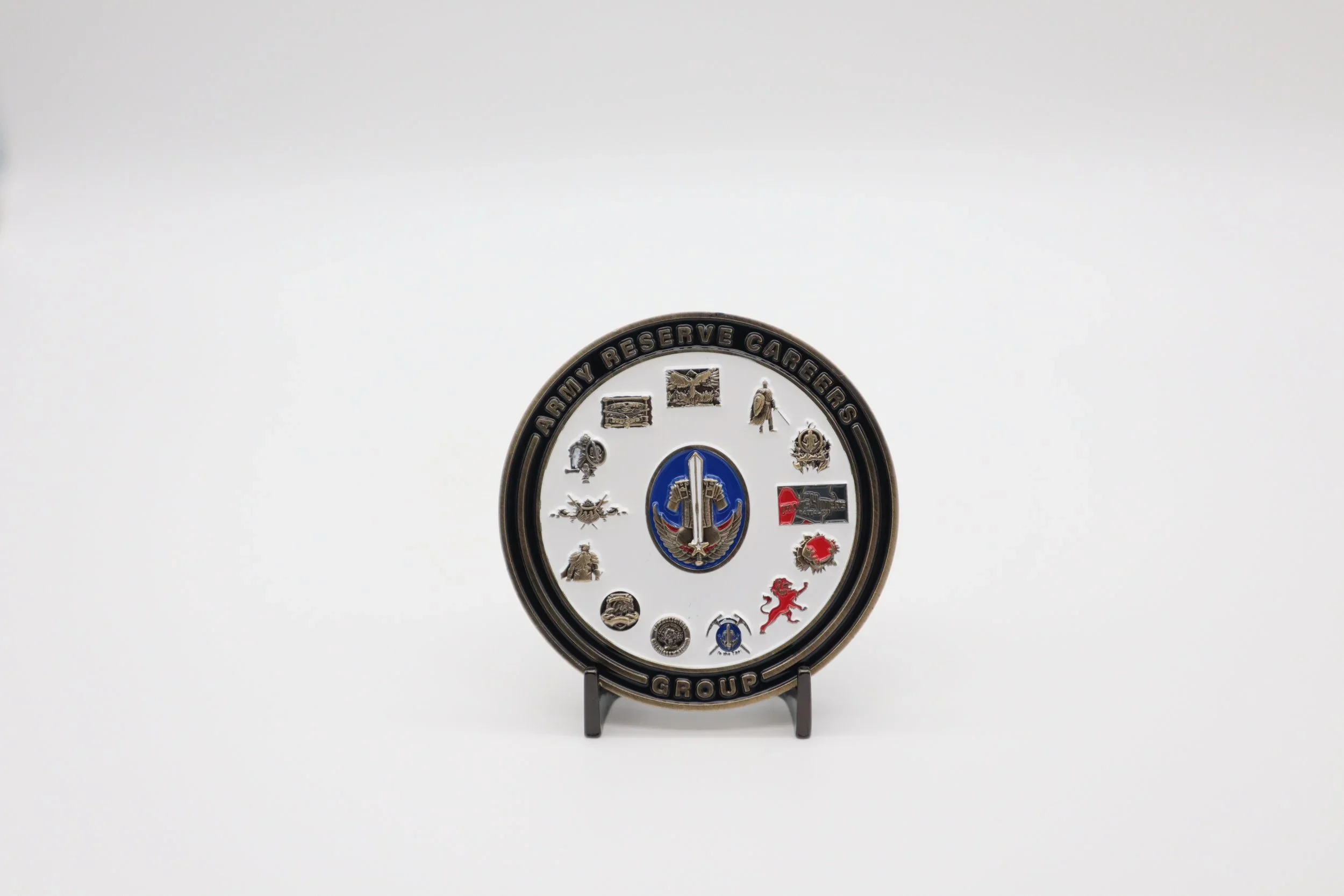 A round military-themed award or badge with various insignias and symbols related to the U.S. Army Reserve, mounted on a stand against a plain white background.