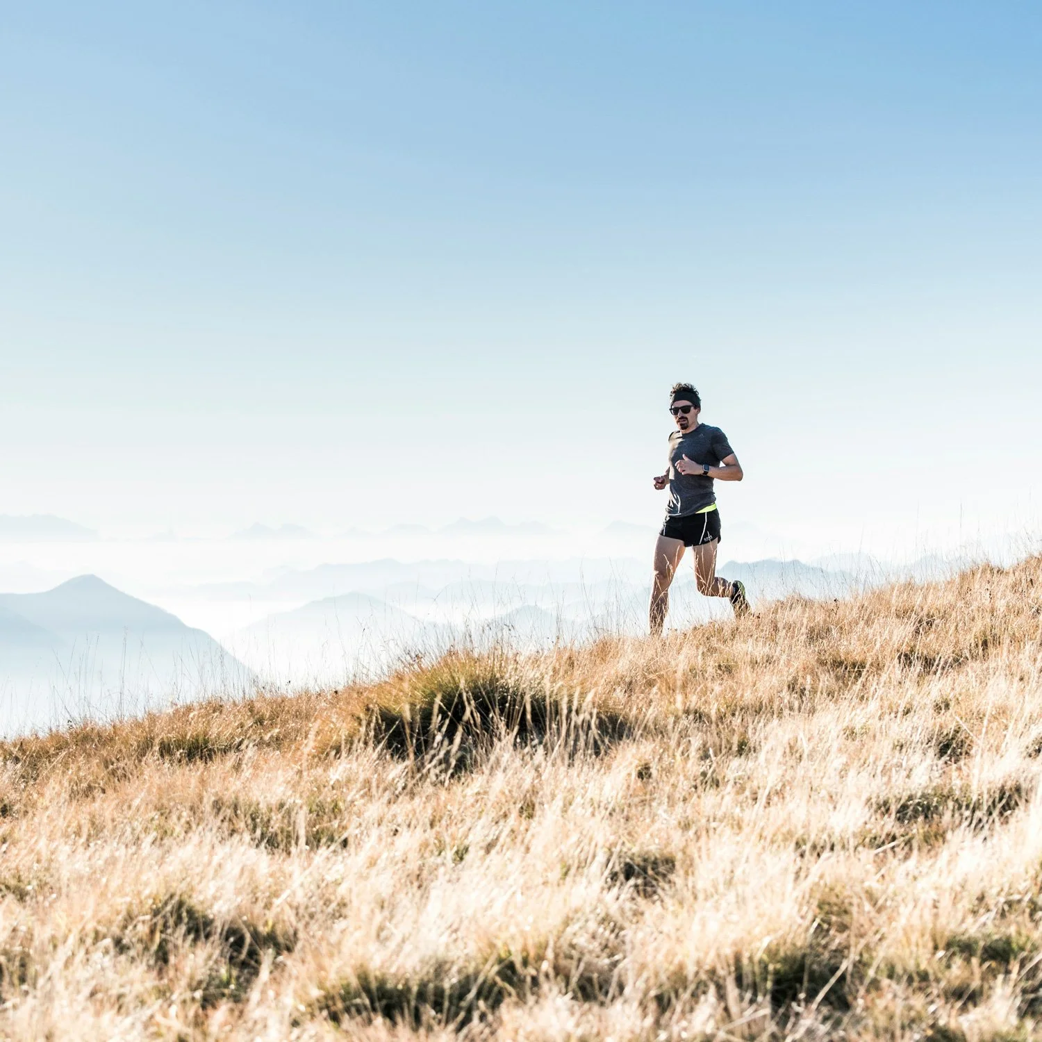 Runner runs on the trail.