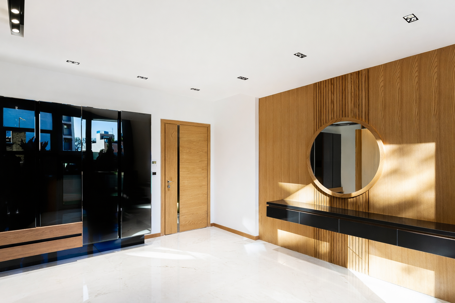 Modern residential vanity wall with custom wood paneling, floating console, and floor-to-ceiling glazing designed by ReArt.
